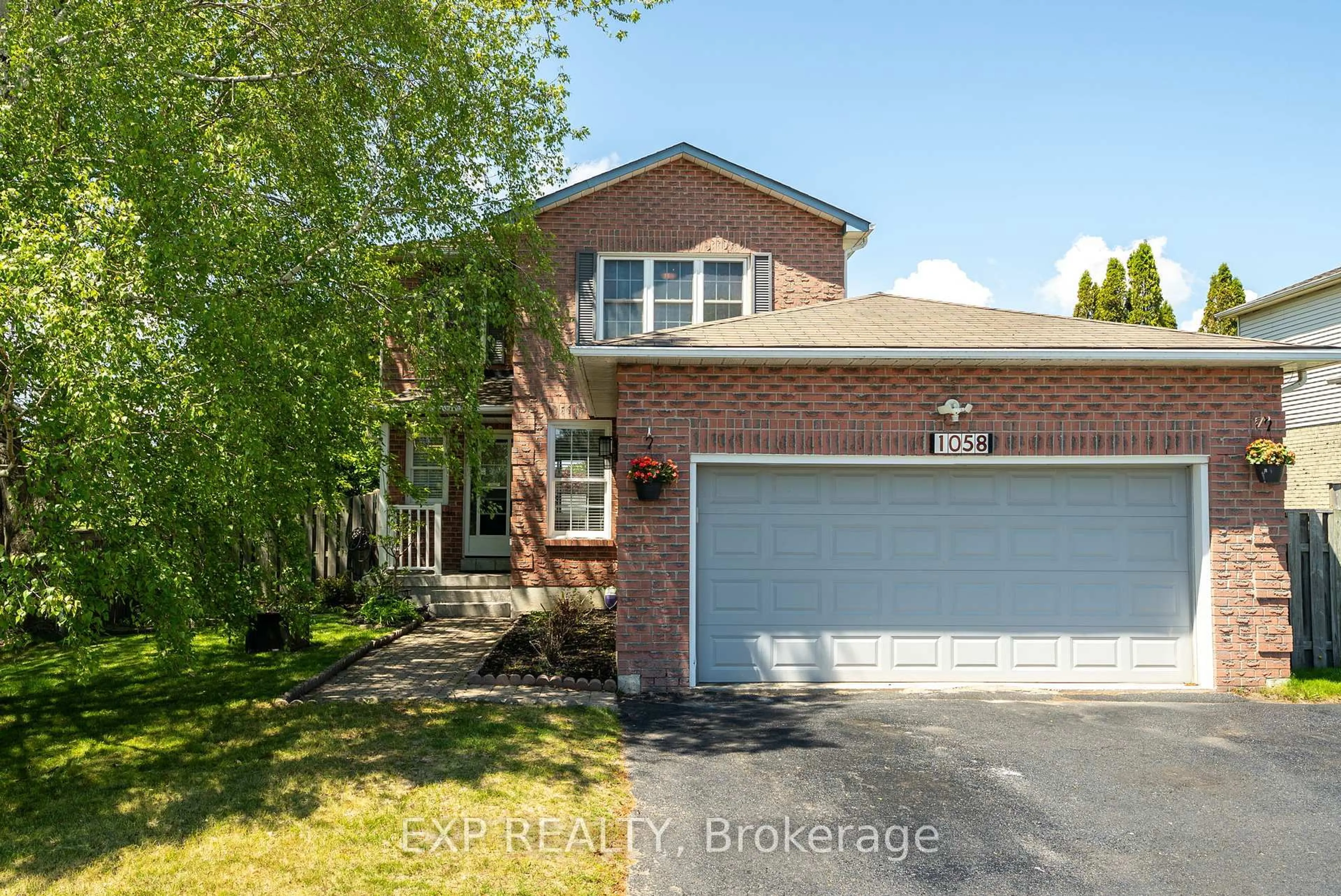 Home with brick exterior material, street for 1058 Renaissance Dr, Oshawa Ontario L1J 8A8