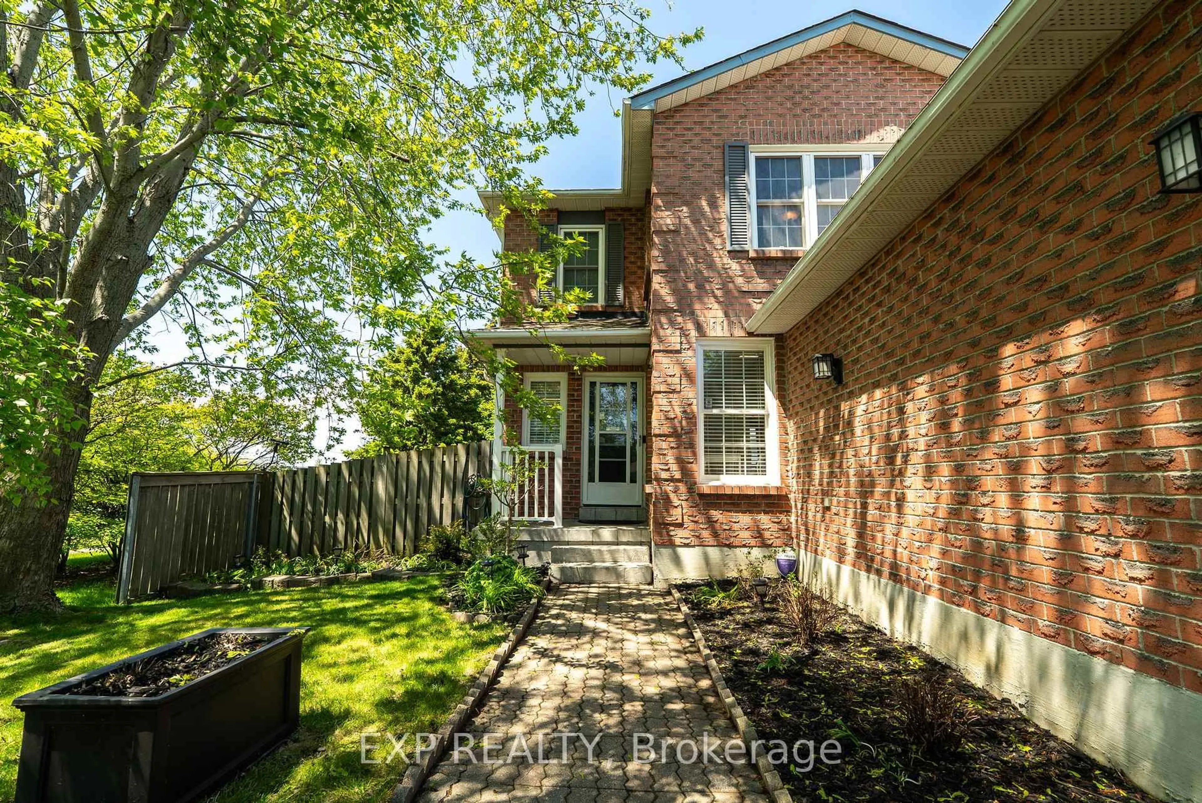 Home with brick exterior material, street for 1058 Renaissance Dr, Oshawa Ontario L1J 8A8