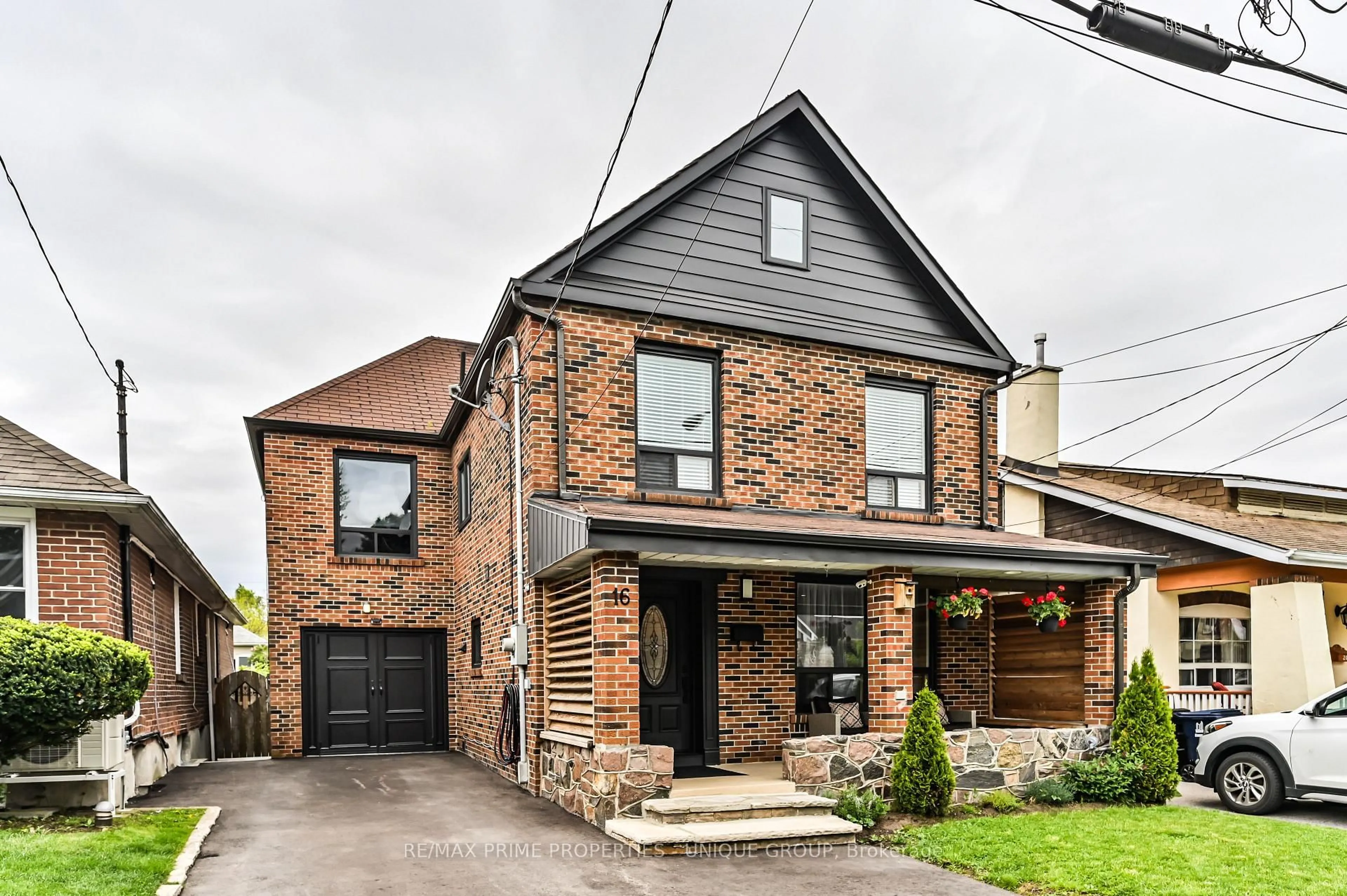 Home with brick exterior material, street for 16 Eastwood Ave, Toronto Ontario M1N 3G9