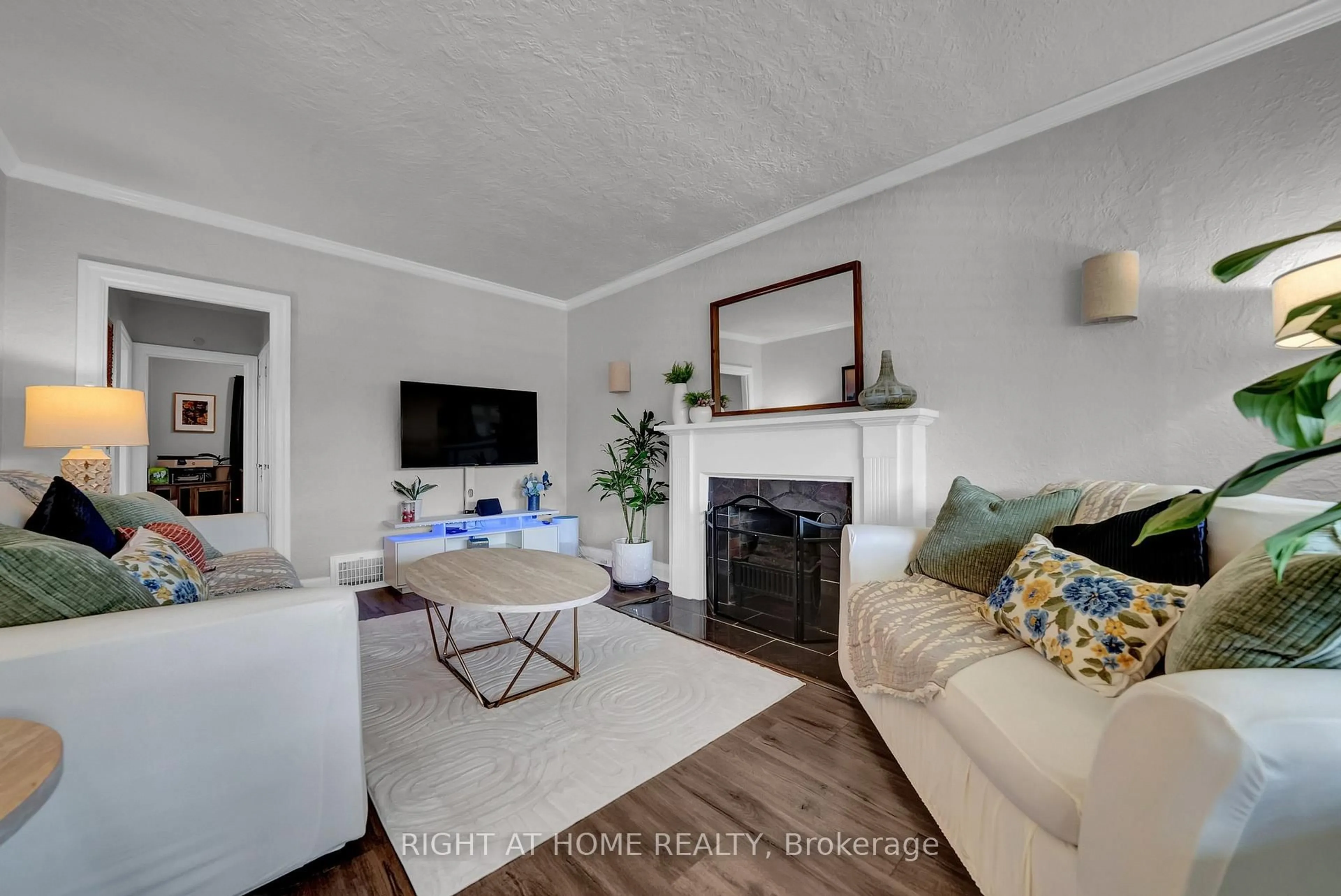 Living room with furniture, wood/laminate floor for 244 Oshawa Blvd, Oshawa Ontario L1G 5S9