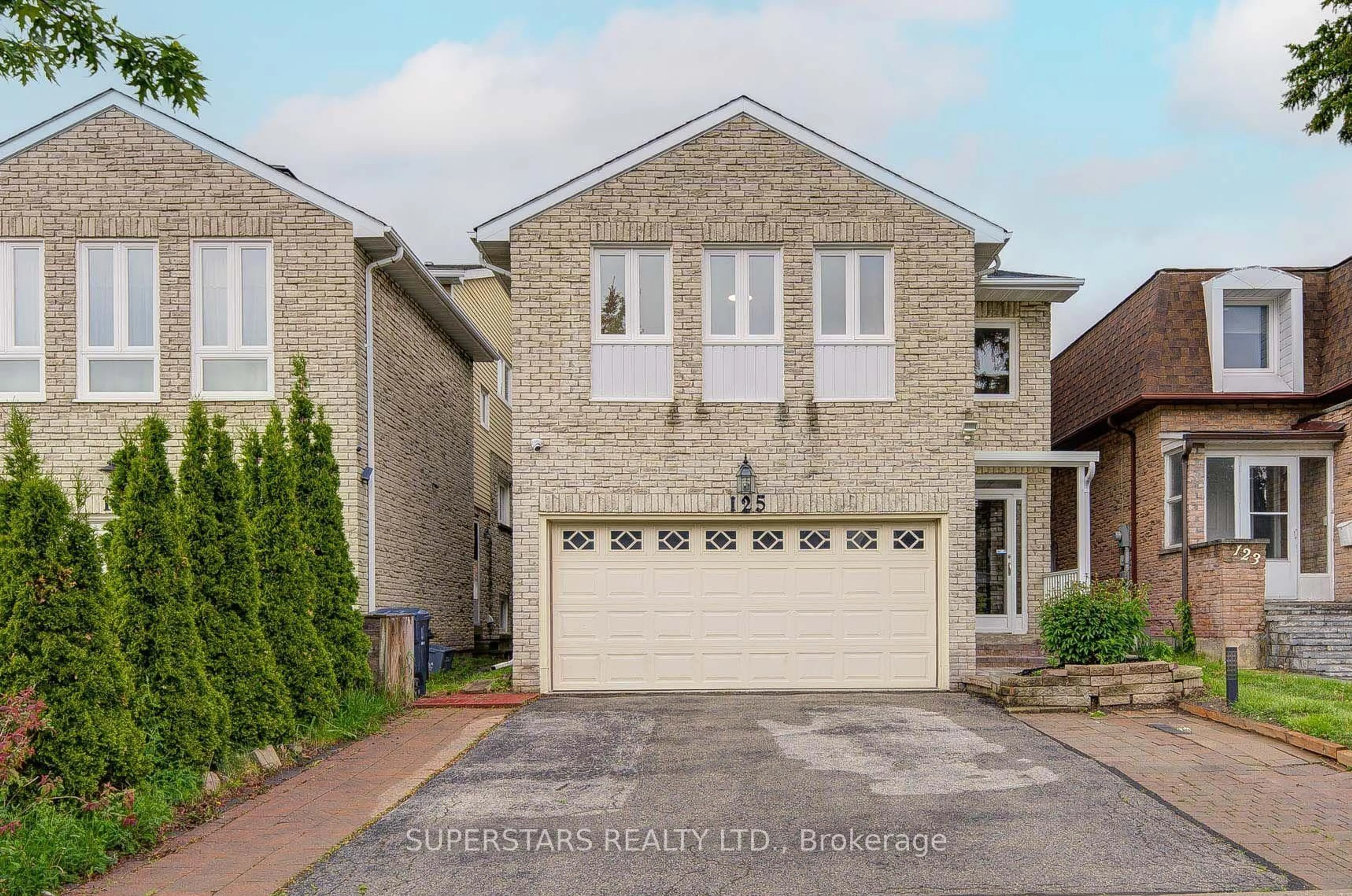 Home with brick exterior material, street for 125 Sandyhook Sq, Toronto Ontario M1W 3N6