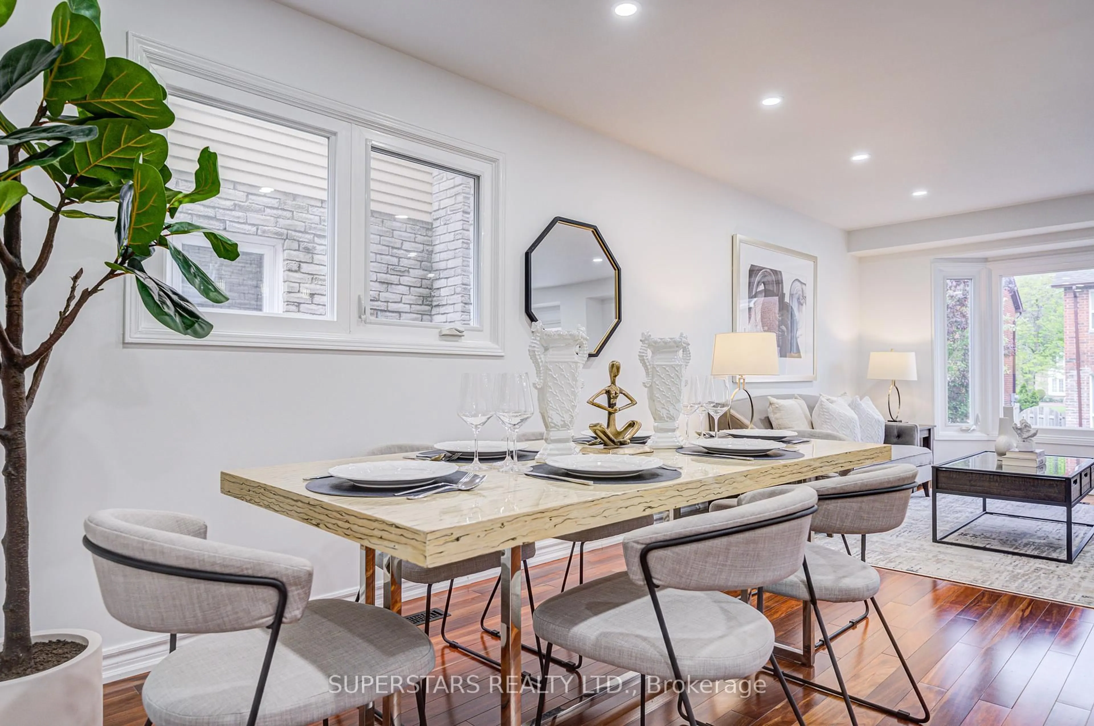 Dining room, wood/laminate floor for 125 Sandyhook Sq, Toronto Ontario M1W 3N6