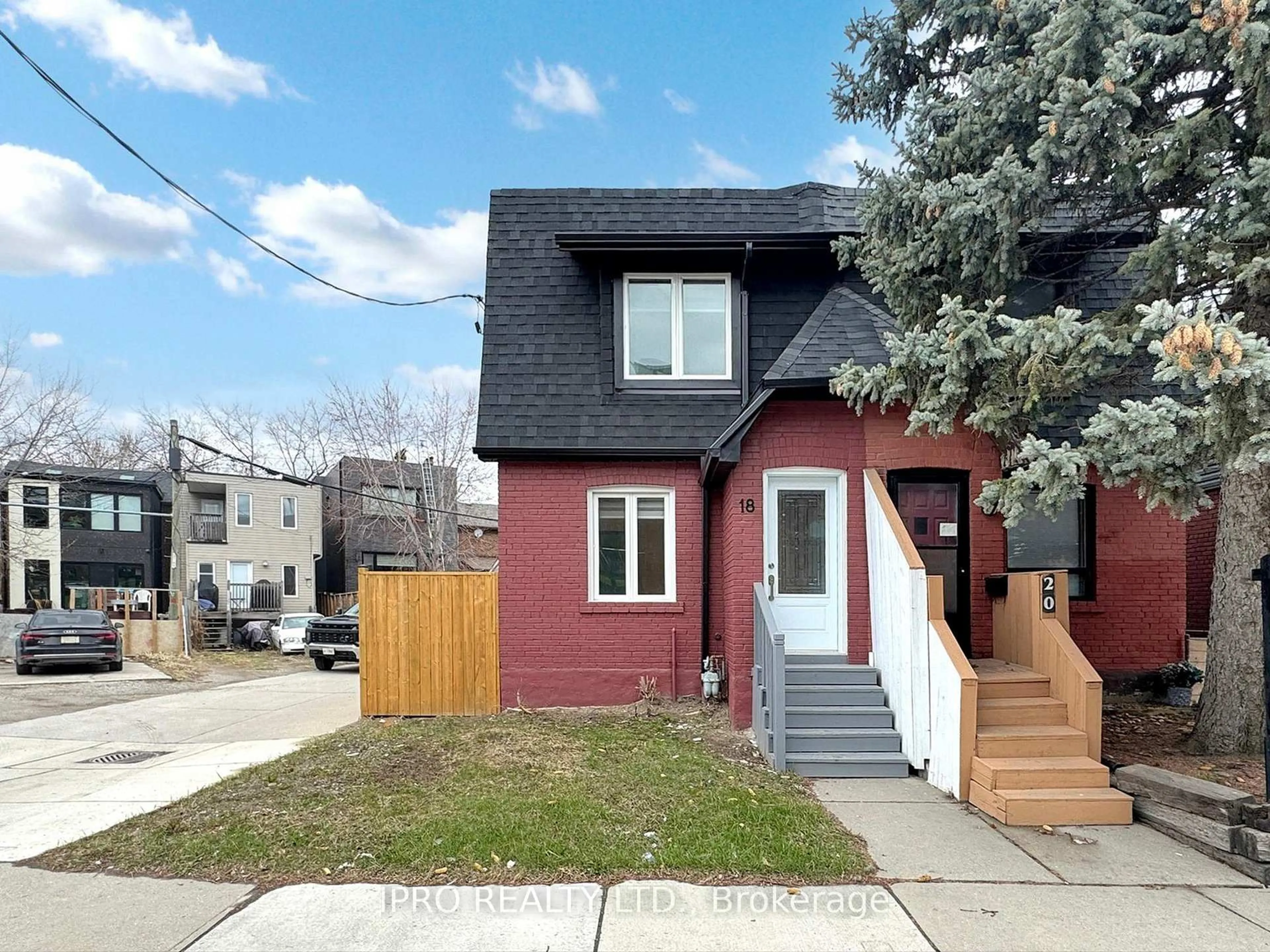 Home with vinyl exterior material, street for 18 Mosley St, Toronto Ontario M4M 1G2