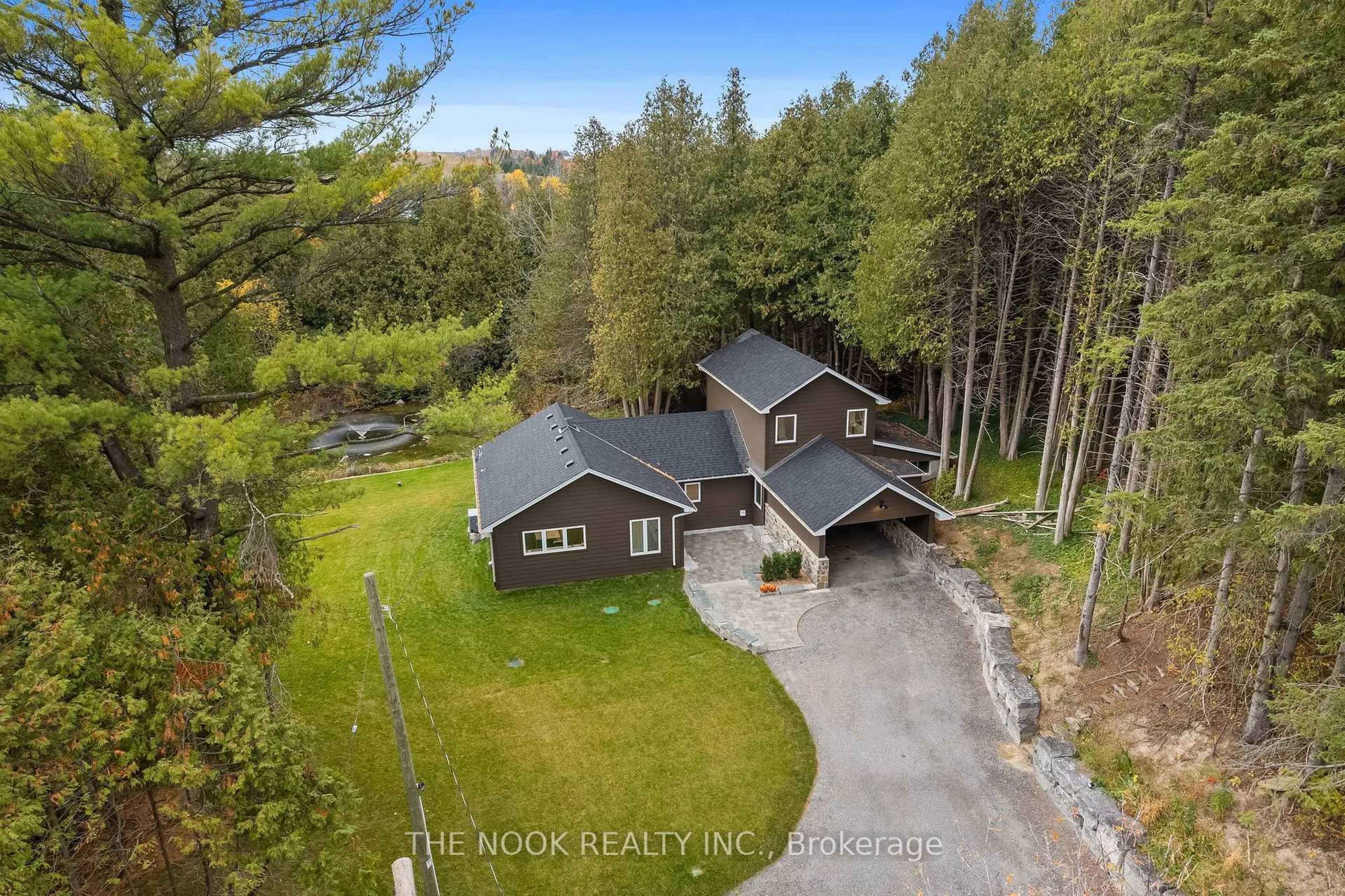 A pic from outside/outdoor area/front of a property/back of a property/a pic from drone, forest/trees view for 662 Raglan Rd, Oshawa Ontario L1H 7K4