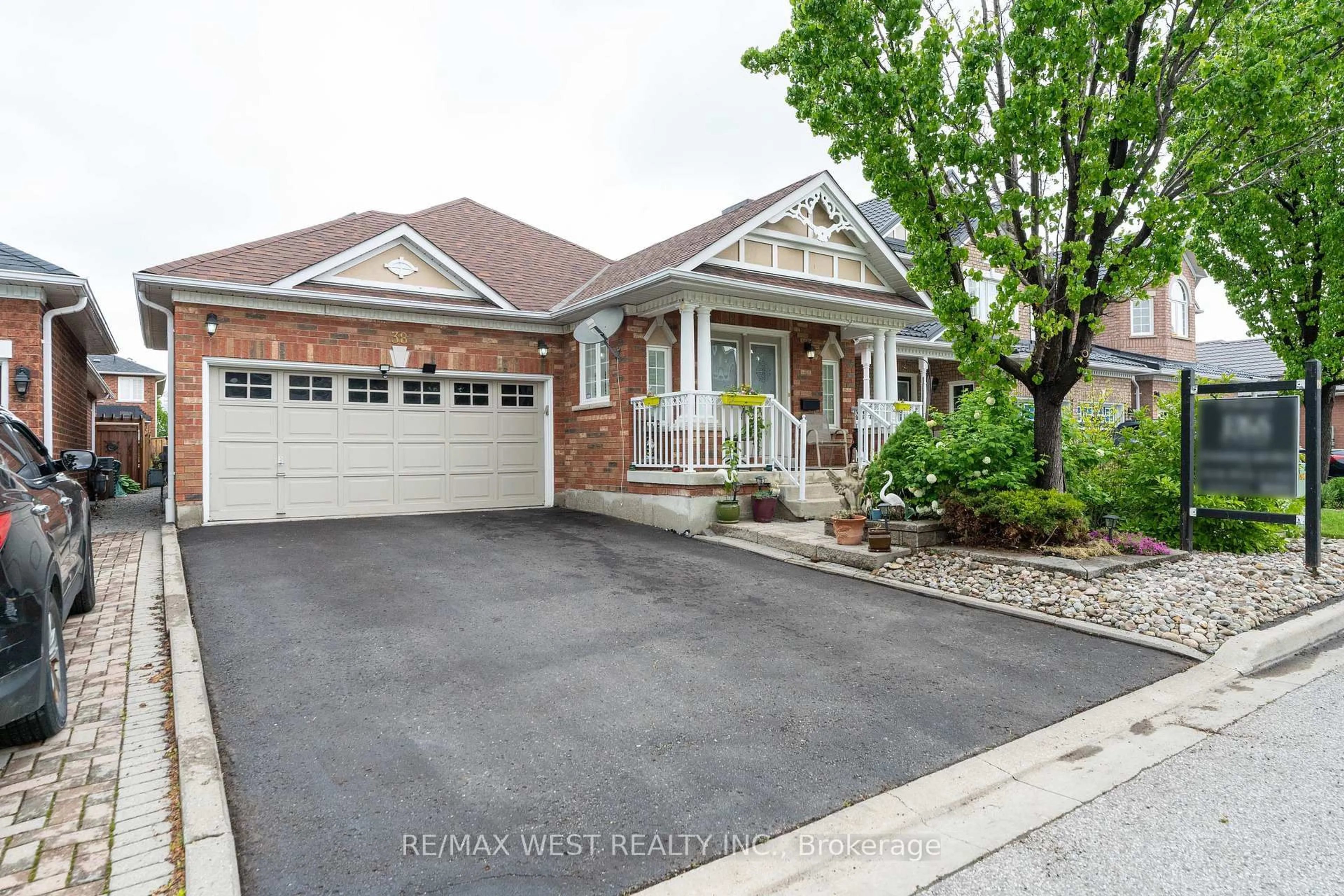 Home with brick exterior material, street for 38 Napiermews Dr, Ajax Ontario L1T 0C9