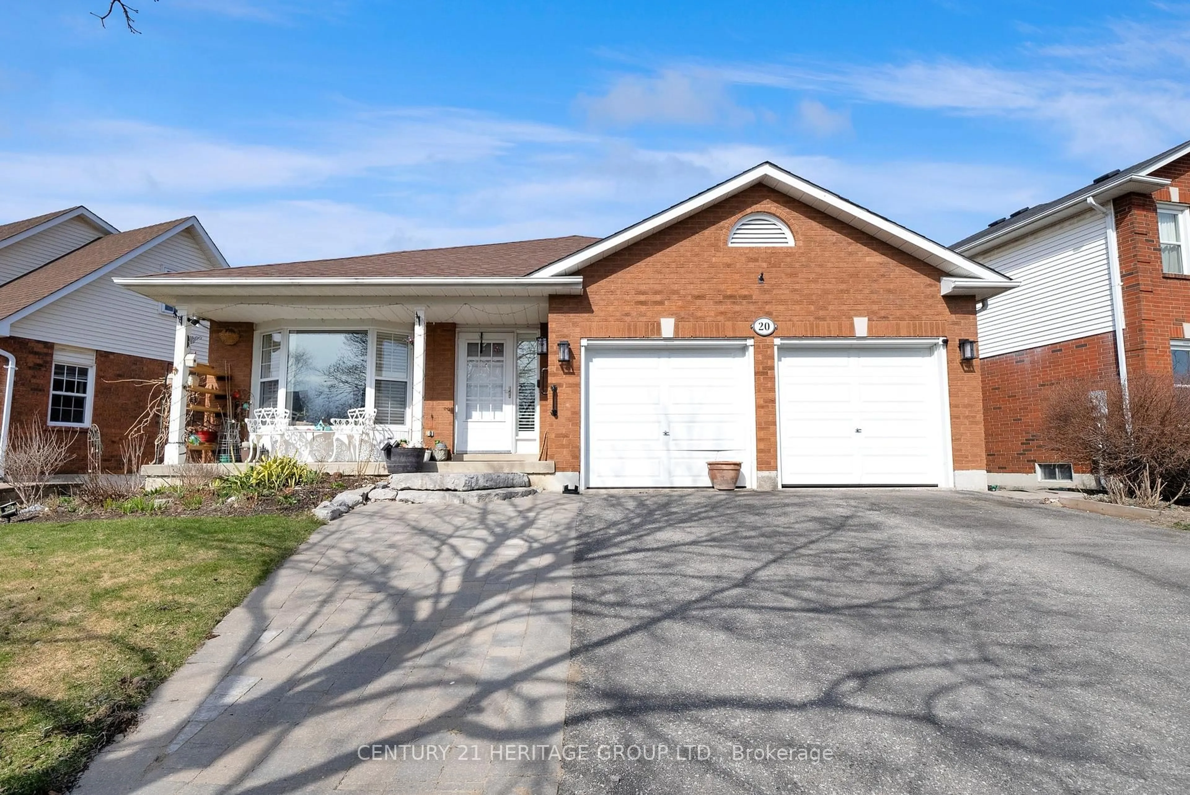 Home with brick exterior material, street for 20 Orchard Park Dr, Clarington Ontario L1C 4E2