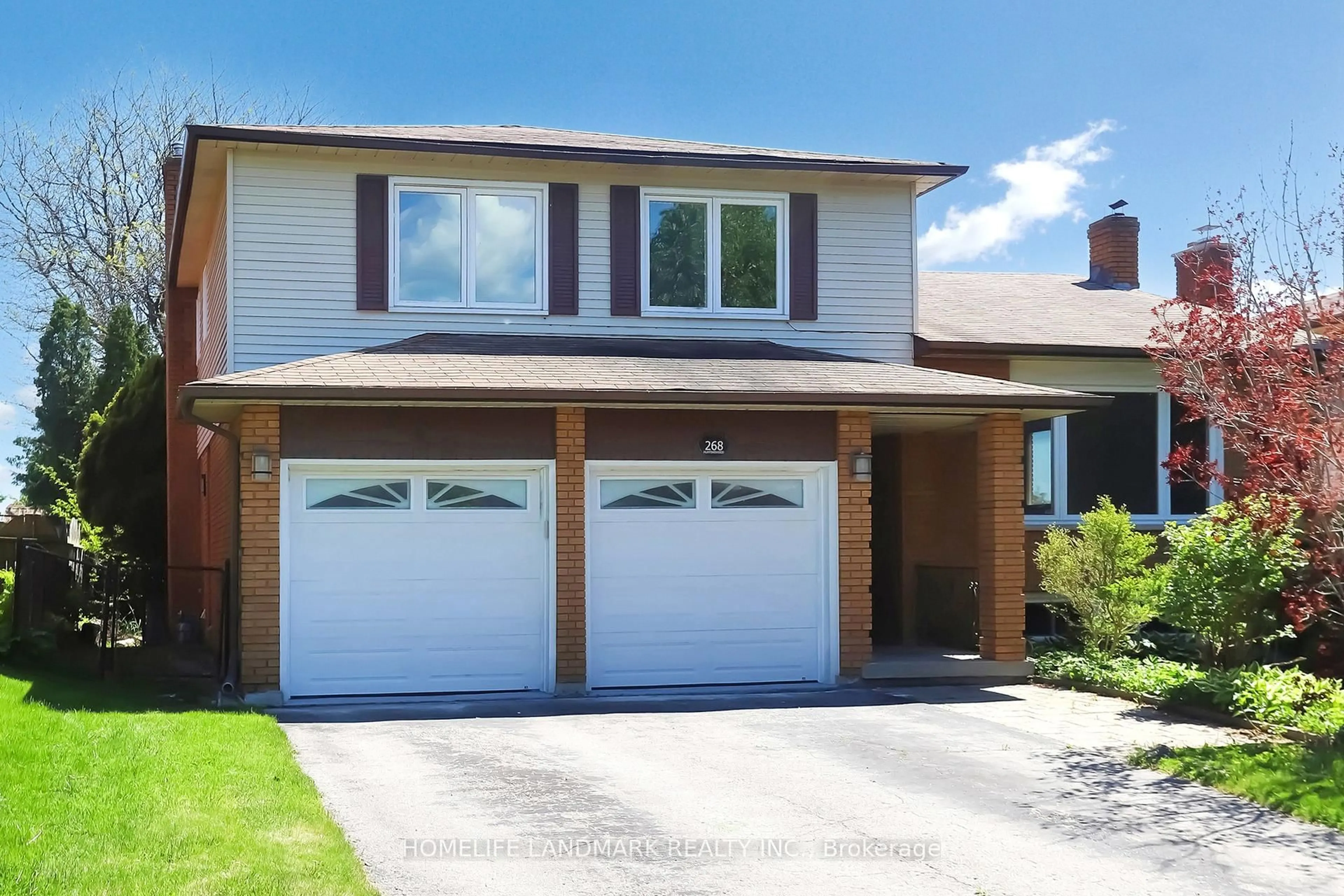 Home with vinyl exterior material, street for 268 Huntingwood Dr, Oshawa Ontario L1J 7C5