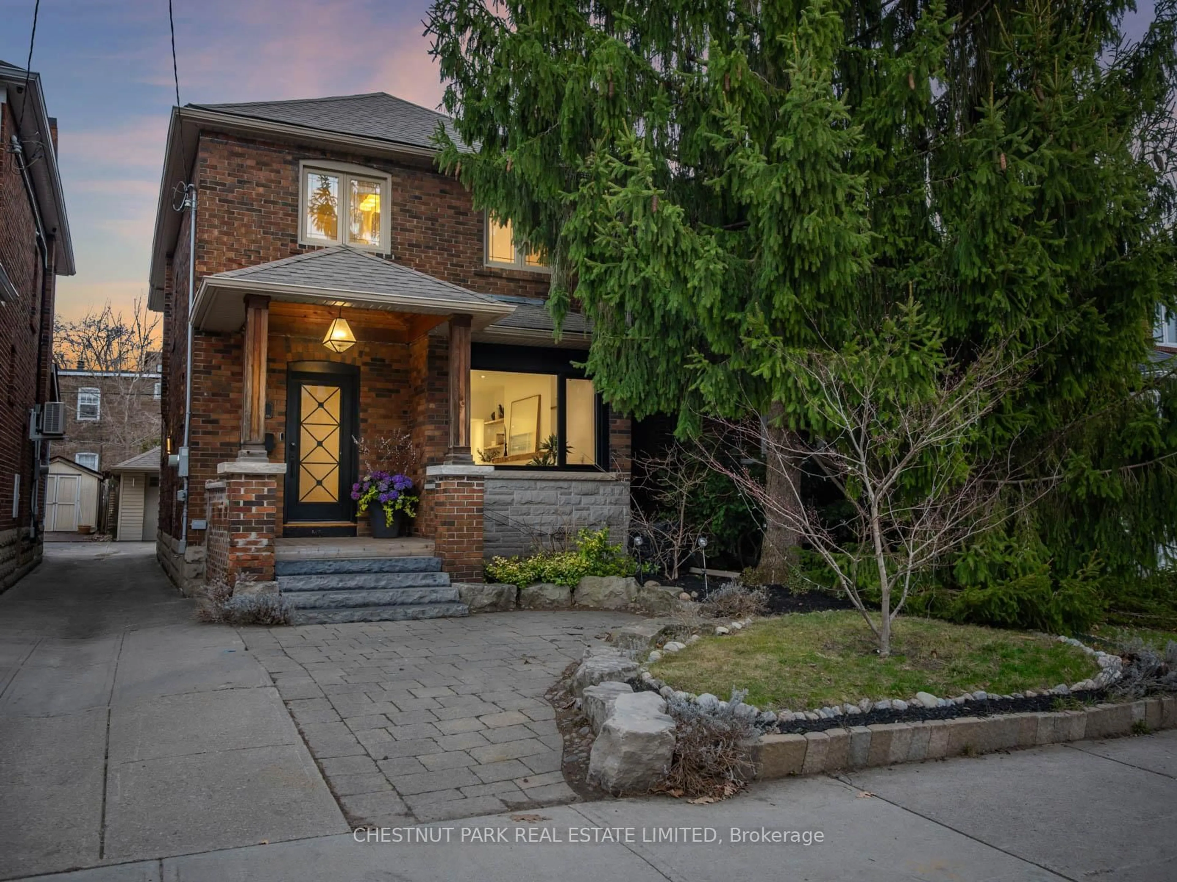 Home with brick exterior material, street for 97 Wineva Ave, Toronto Ontario M4E 2T1
