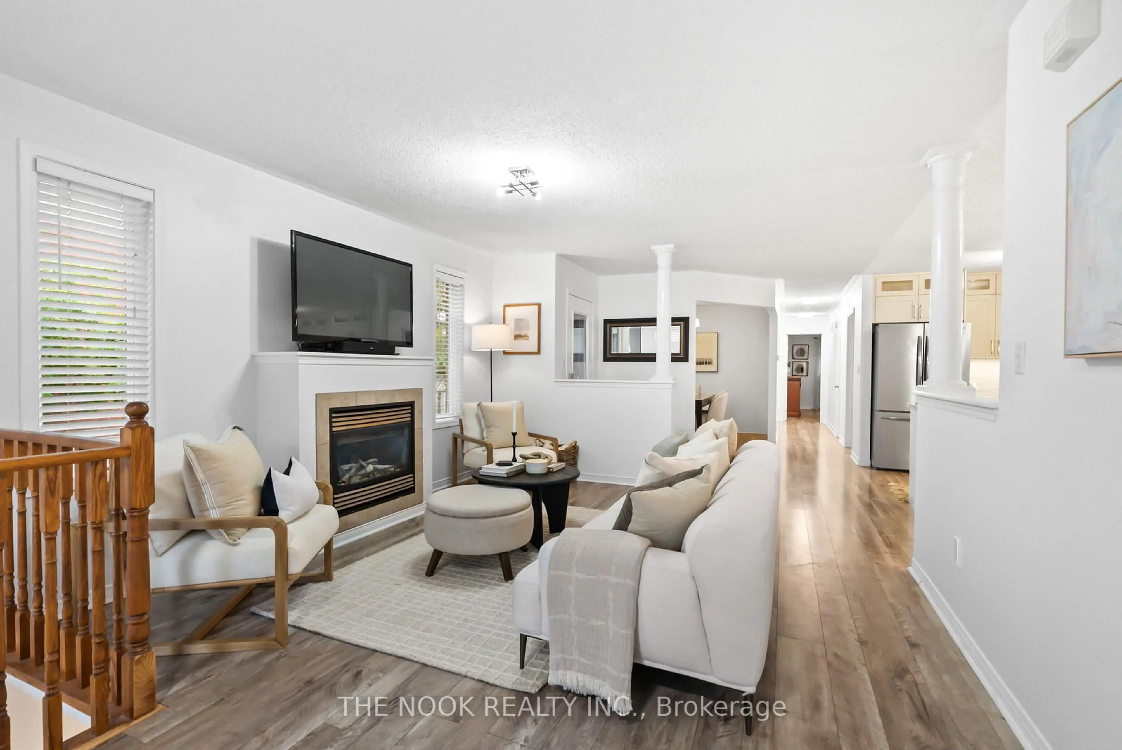 Living room with furniture, wood/laminate floor for 183 High St, Clarington Ontario L1C 5A6