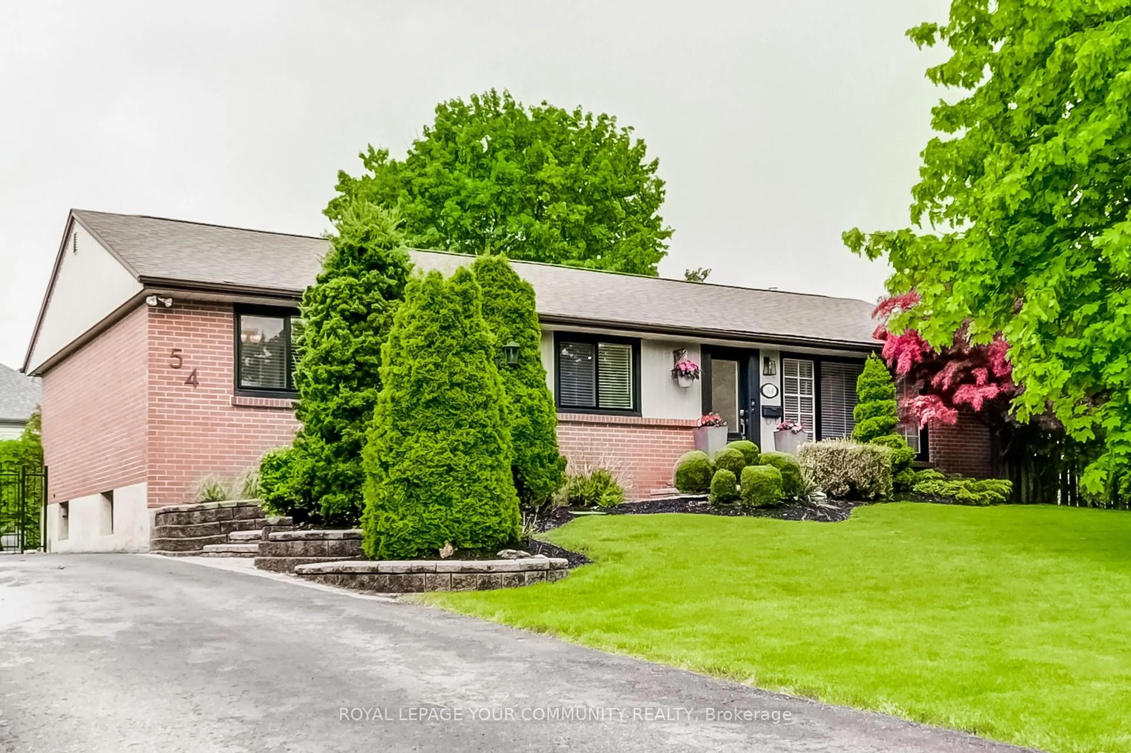 Home with brick exterior material, street for 54 Montgomery Ave, Whitby Ontario L1M 1B1