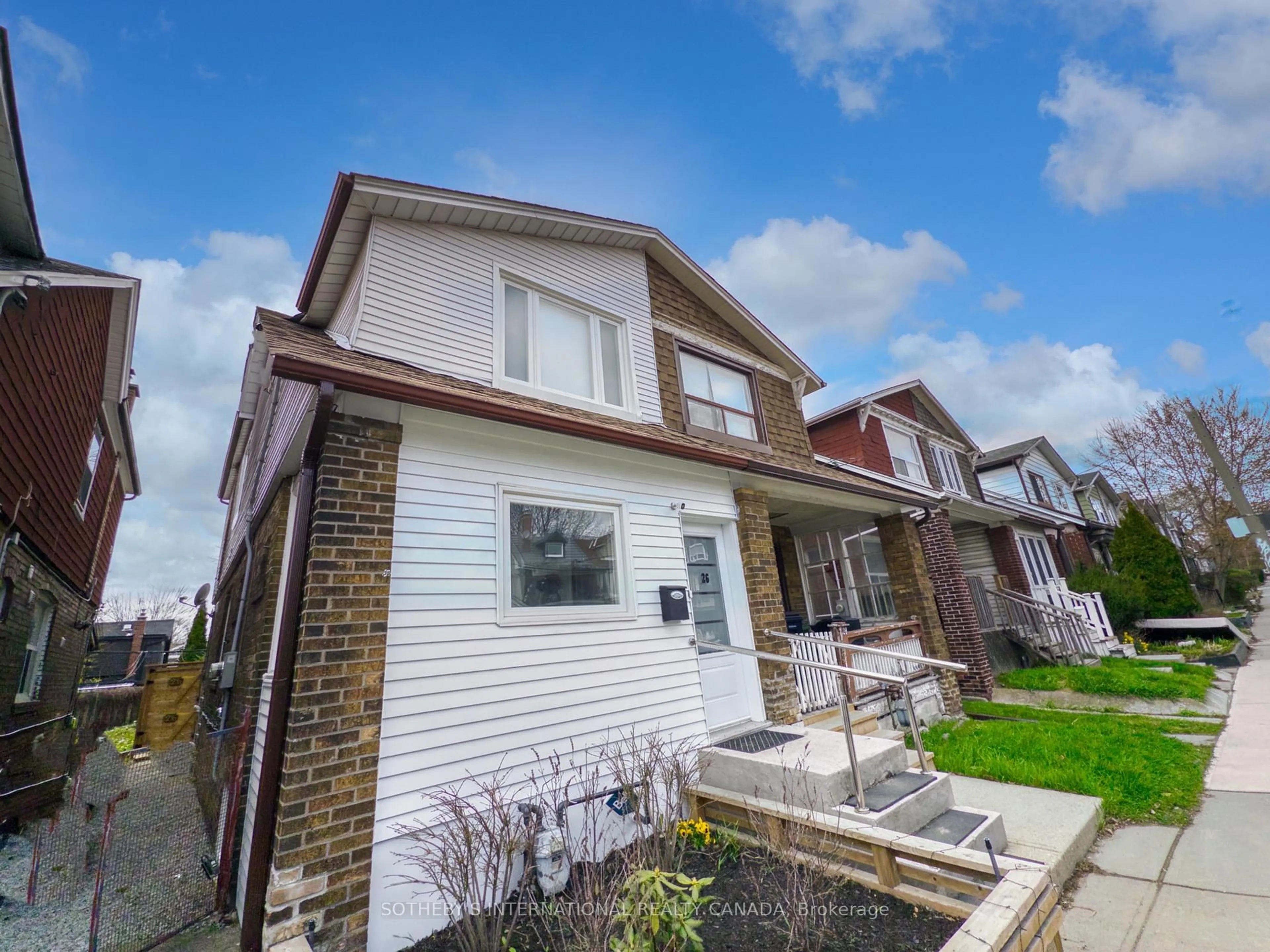Home with brick exterior material, street for 26 Greenwood Ave, Toronto Ontario M4L 2P4