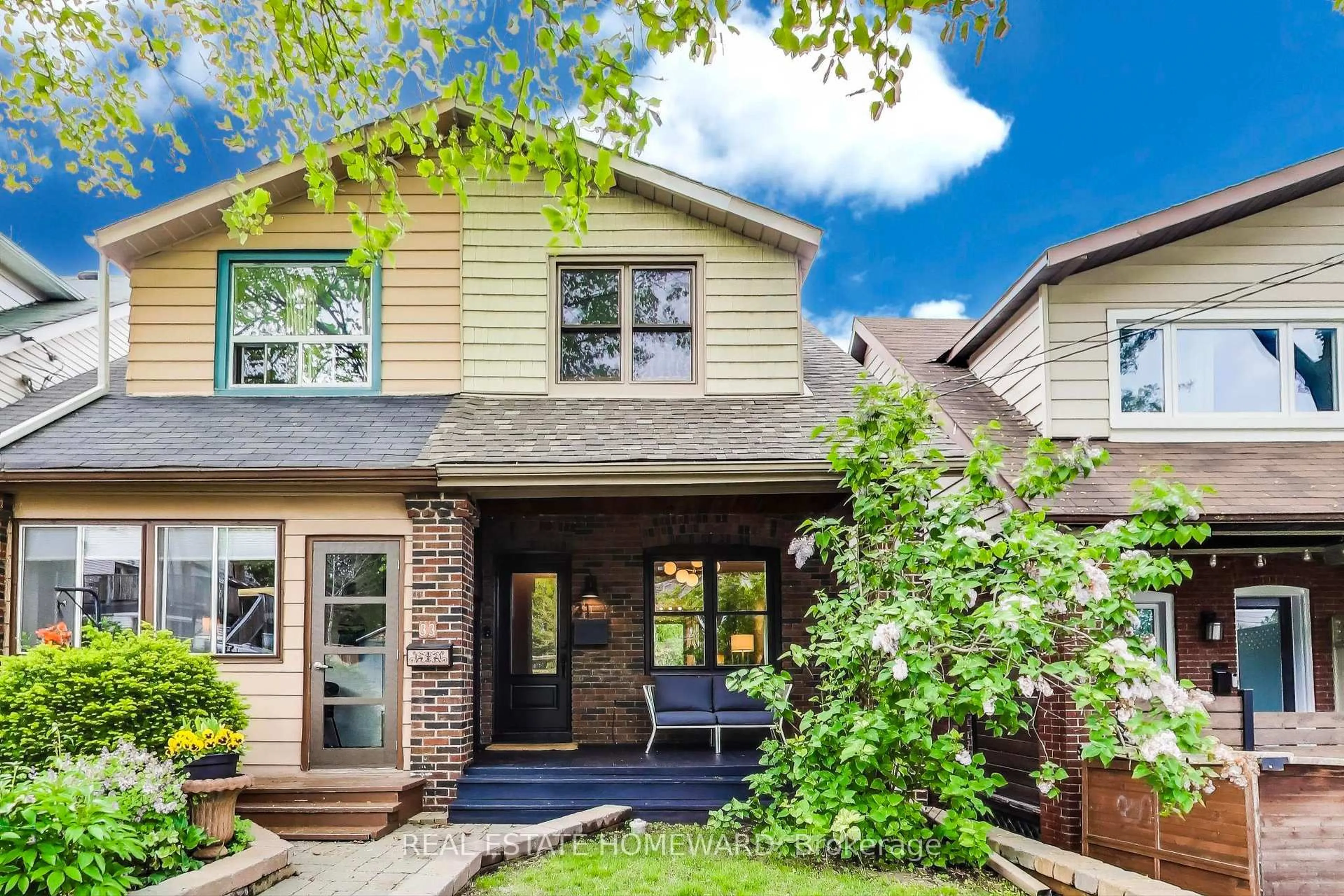 Home with brick exterior material, street for 31 Glenmore Rd, Toronto Ontario M4L 3M1