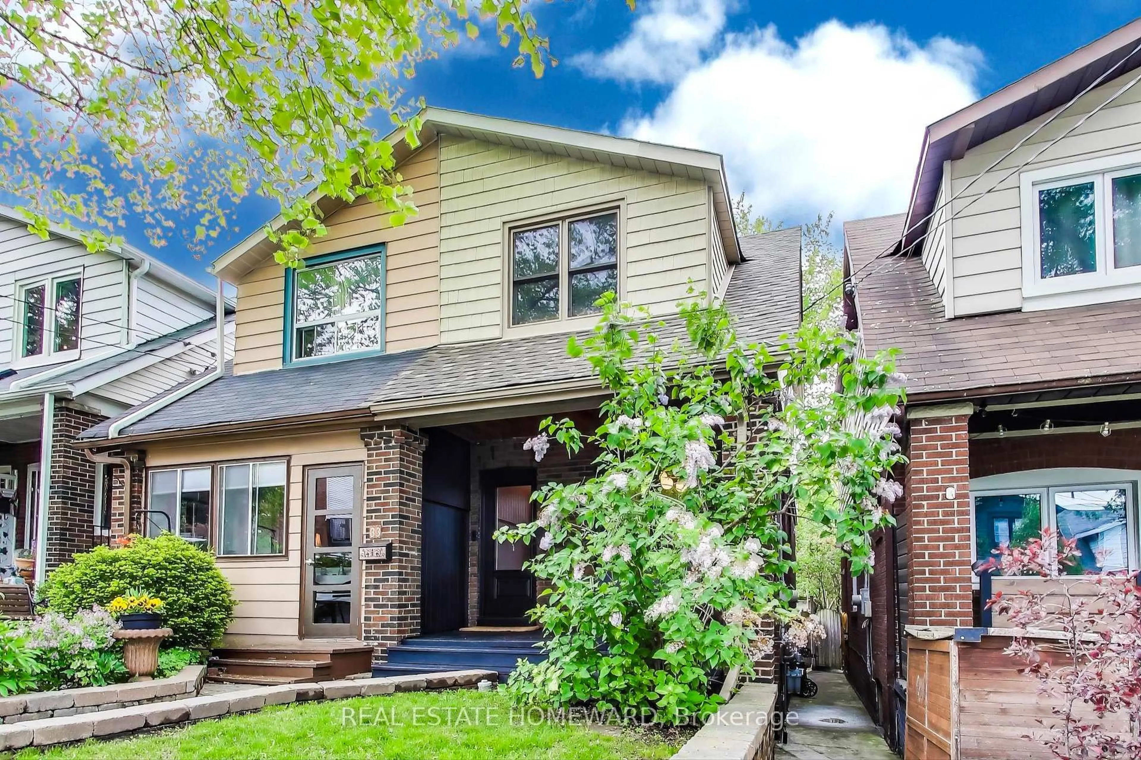 Home with brick exterior material, street for 31 Glenmore Rd, Toronto Ontario M4L 3M1