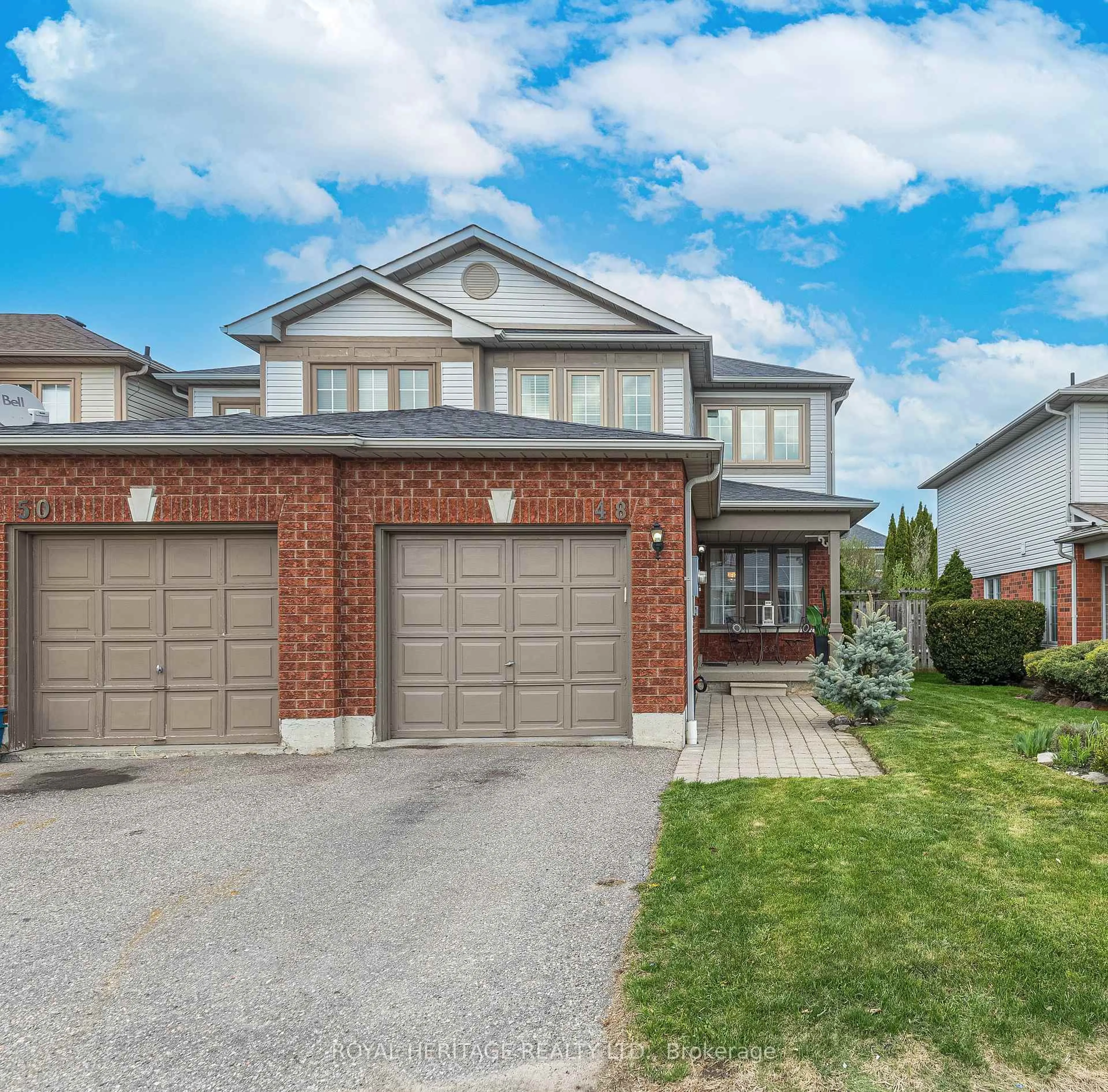 Home with brick exterior material, street for 48 Greengrove Way, Whitby Ontario L1R 2N4