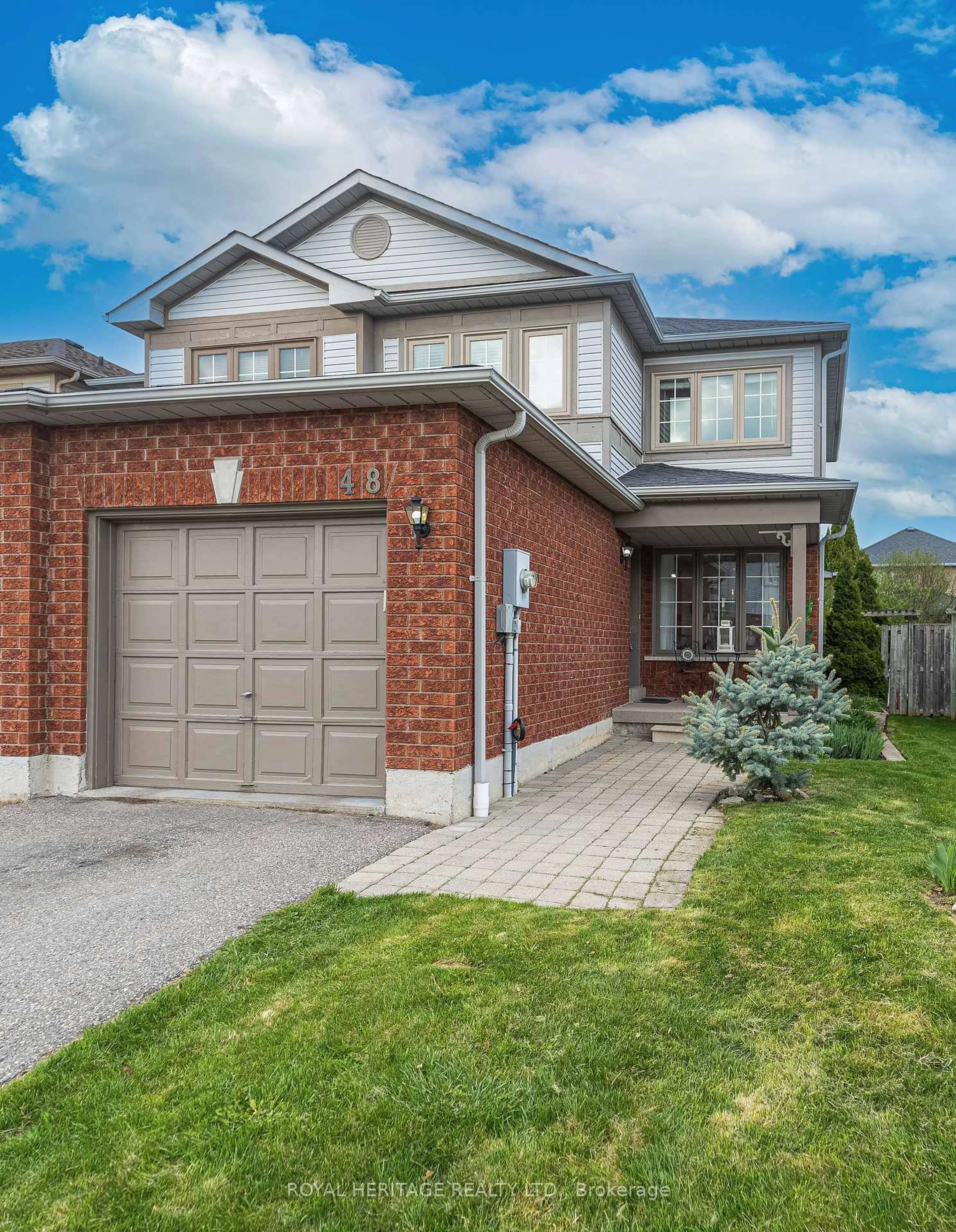 Home with brick exterior material, street for 48 Greengrove Way, Whitby Ontario L1R 2N4