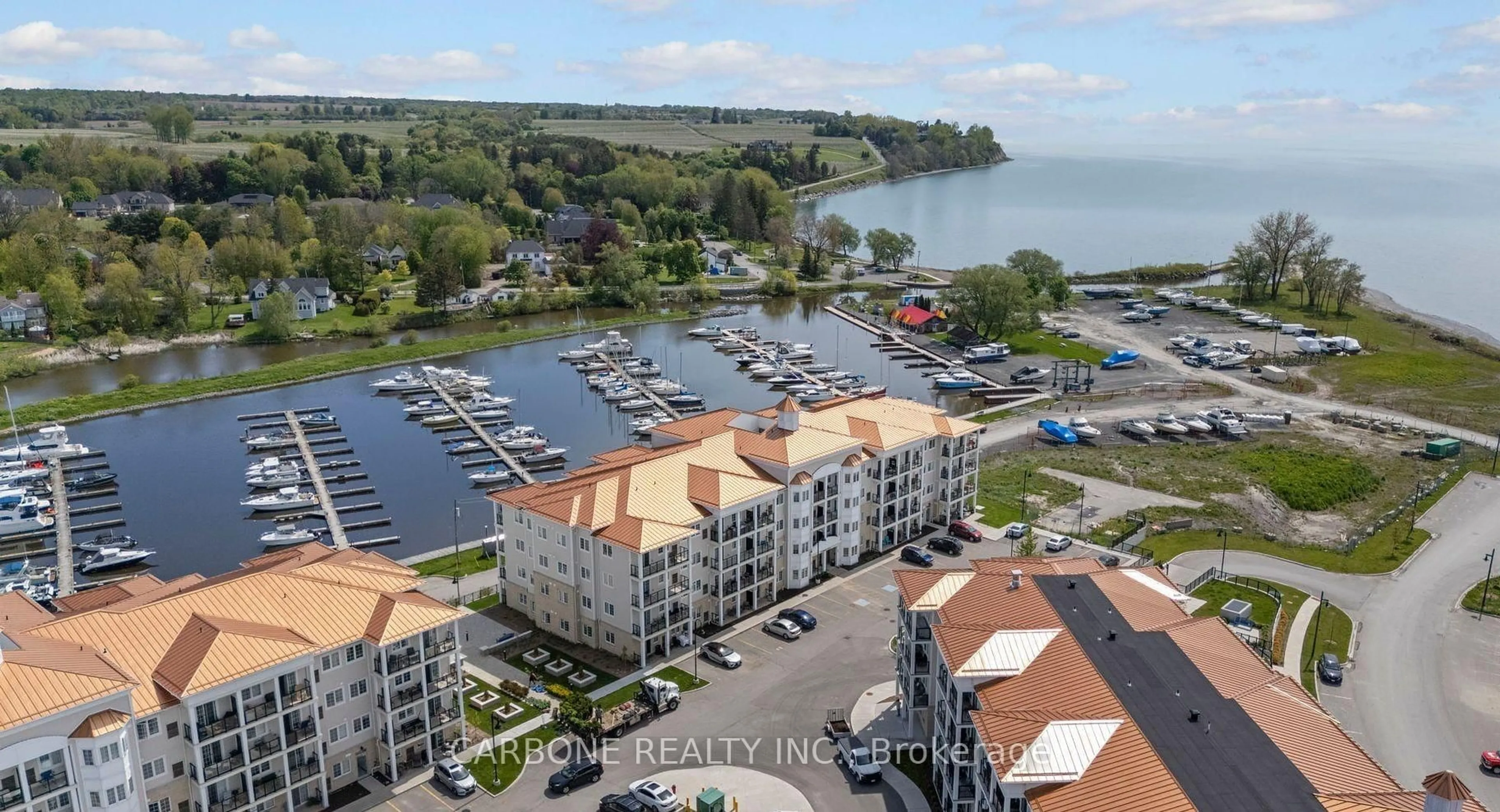 A pic from outside/outdoor area/front of a property/back of a property/a pic from drone, water/lake/river/ocean view for 80 Shipway Ave #102, Clarington Ontario L1B 0B6