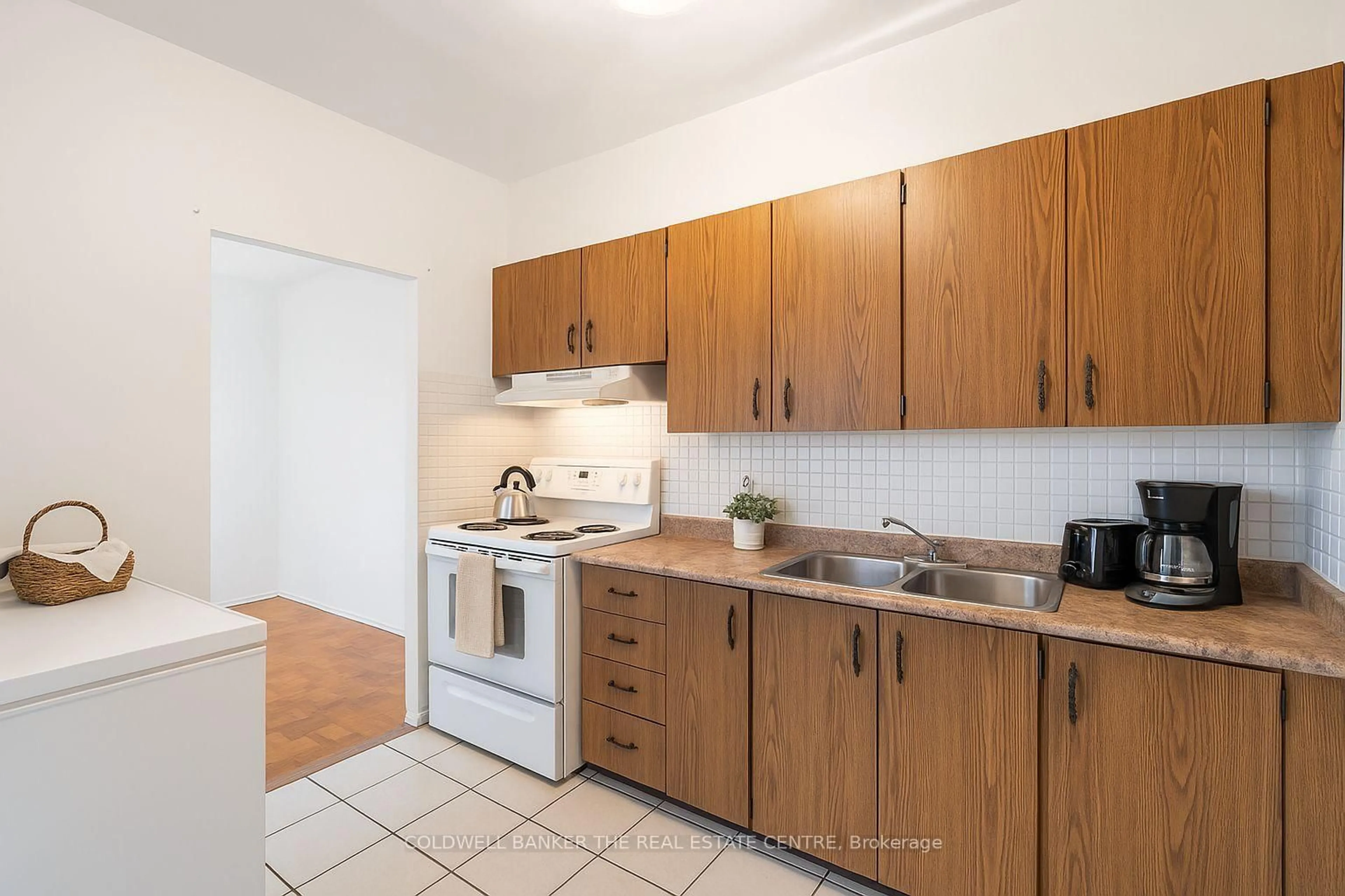 Standard kitchen, unknown for 1 Massey Sq #PH 15, Toronto Ontario M4C 5L4