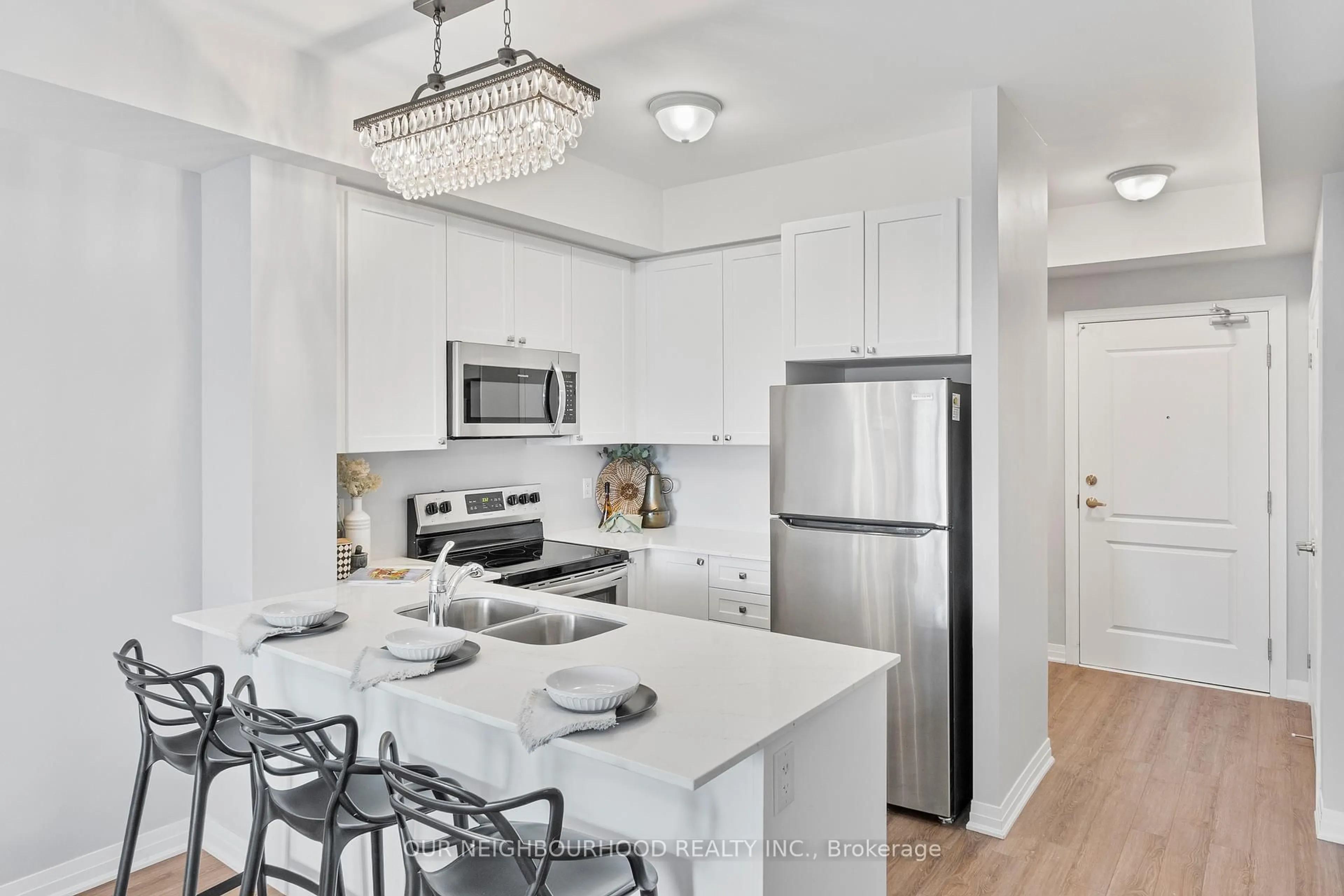 Open concept kitchen, ceramic/tile floor for 65 Shipway Ave #211, Clarington Ontario L1B 0B7