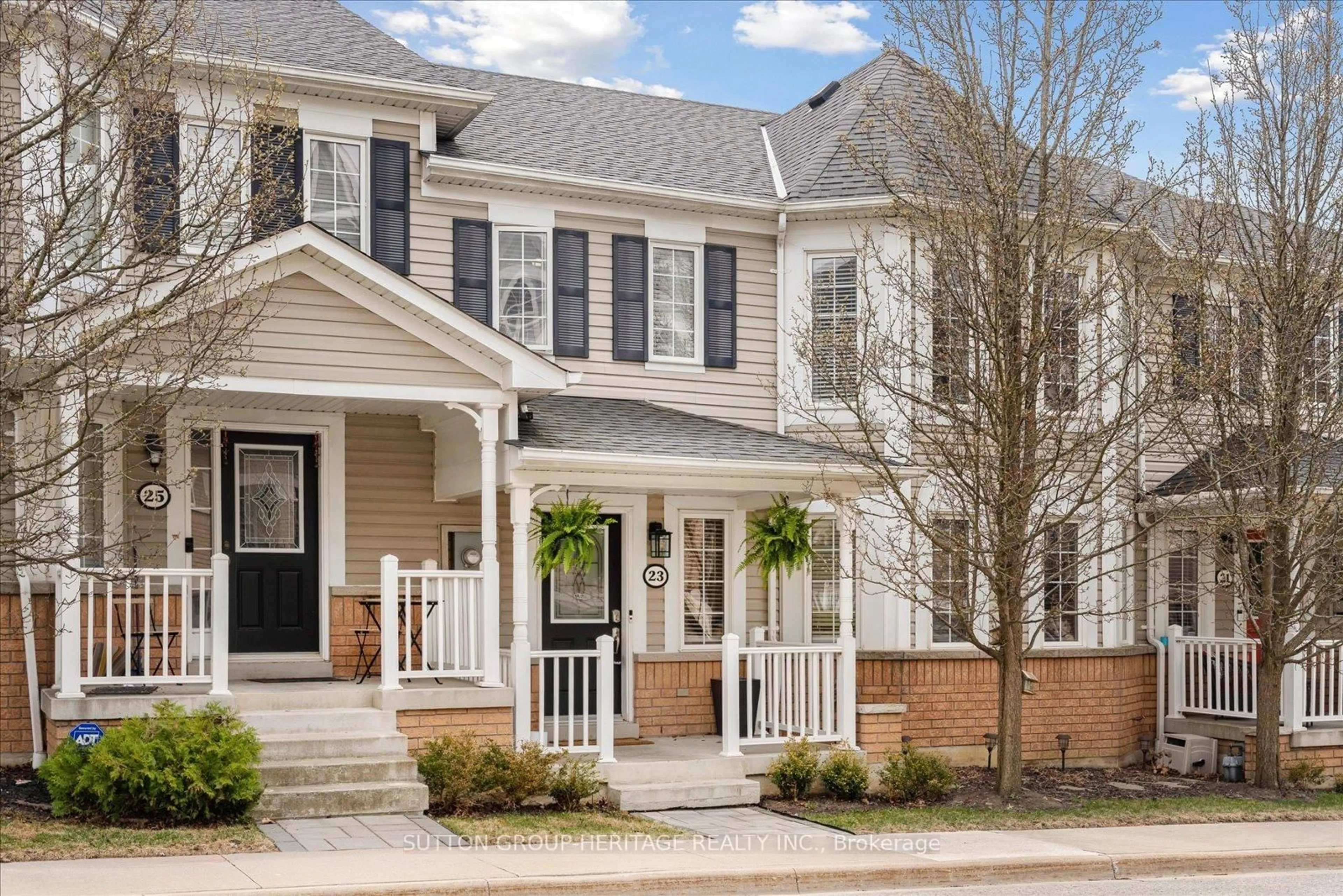 Home with brick exterior material, street for 23 Vallance Way #25, Whitby Ontario L1M 0E7
