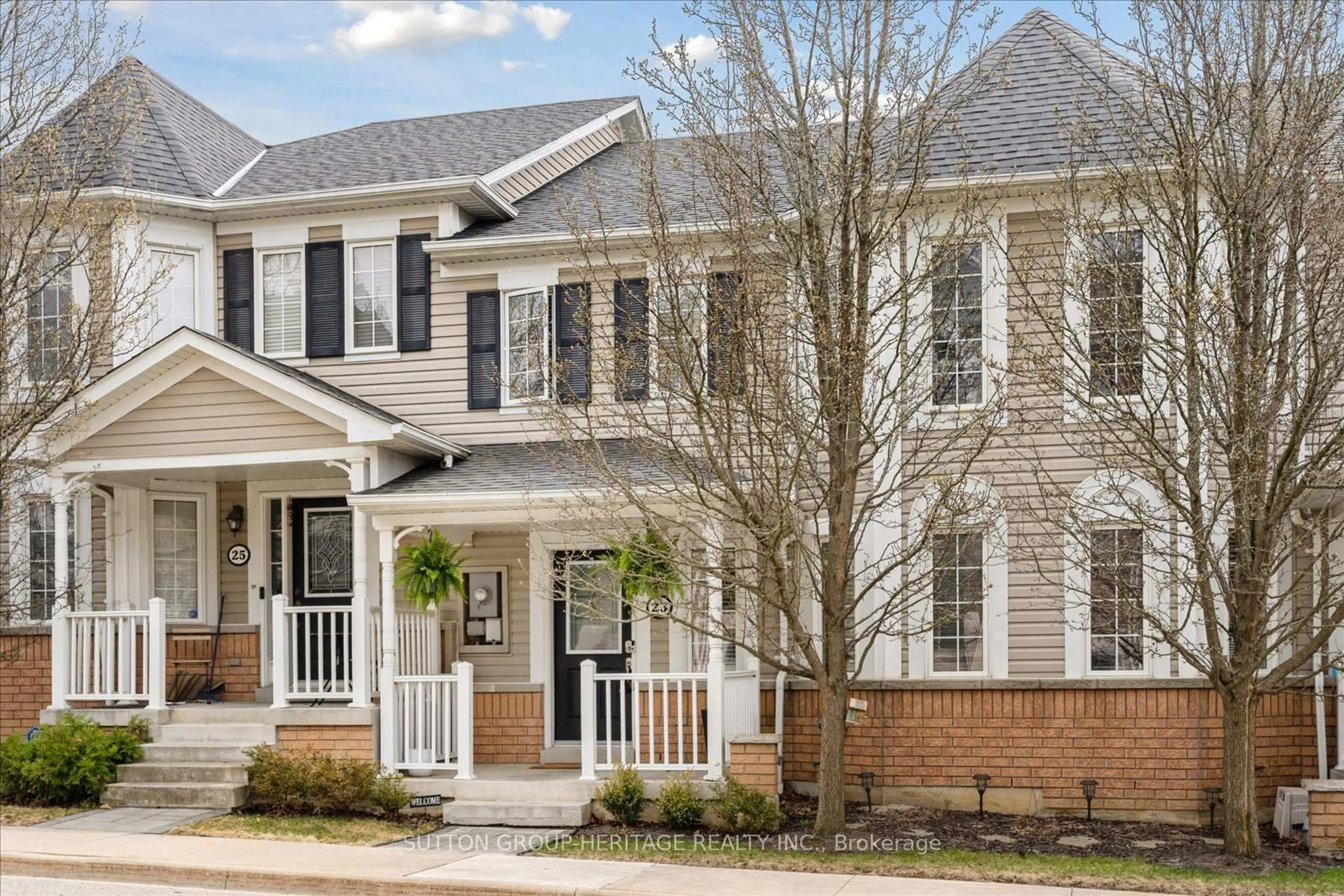 Home with brick exterior material, street for 23 Vallance Way #25, Whitby Ontario L1M 0E7
