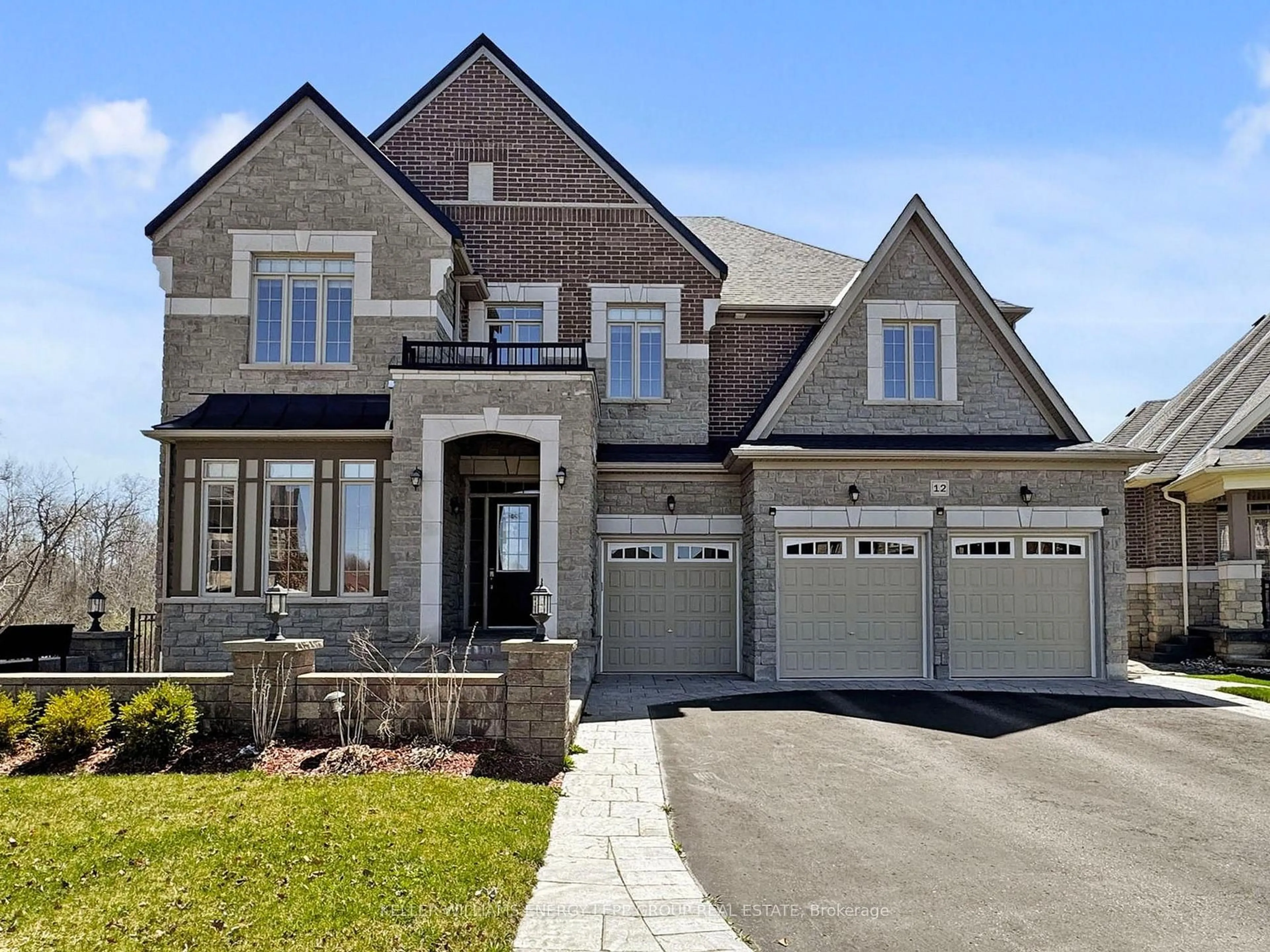 Home with brick exterior material, street for 12 Donwoods Cres, Whitby Ontario L1R 0N1