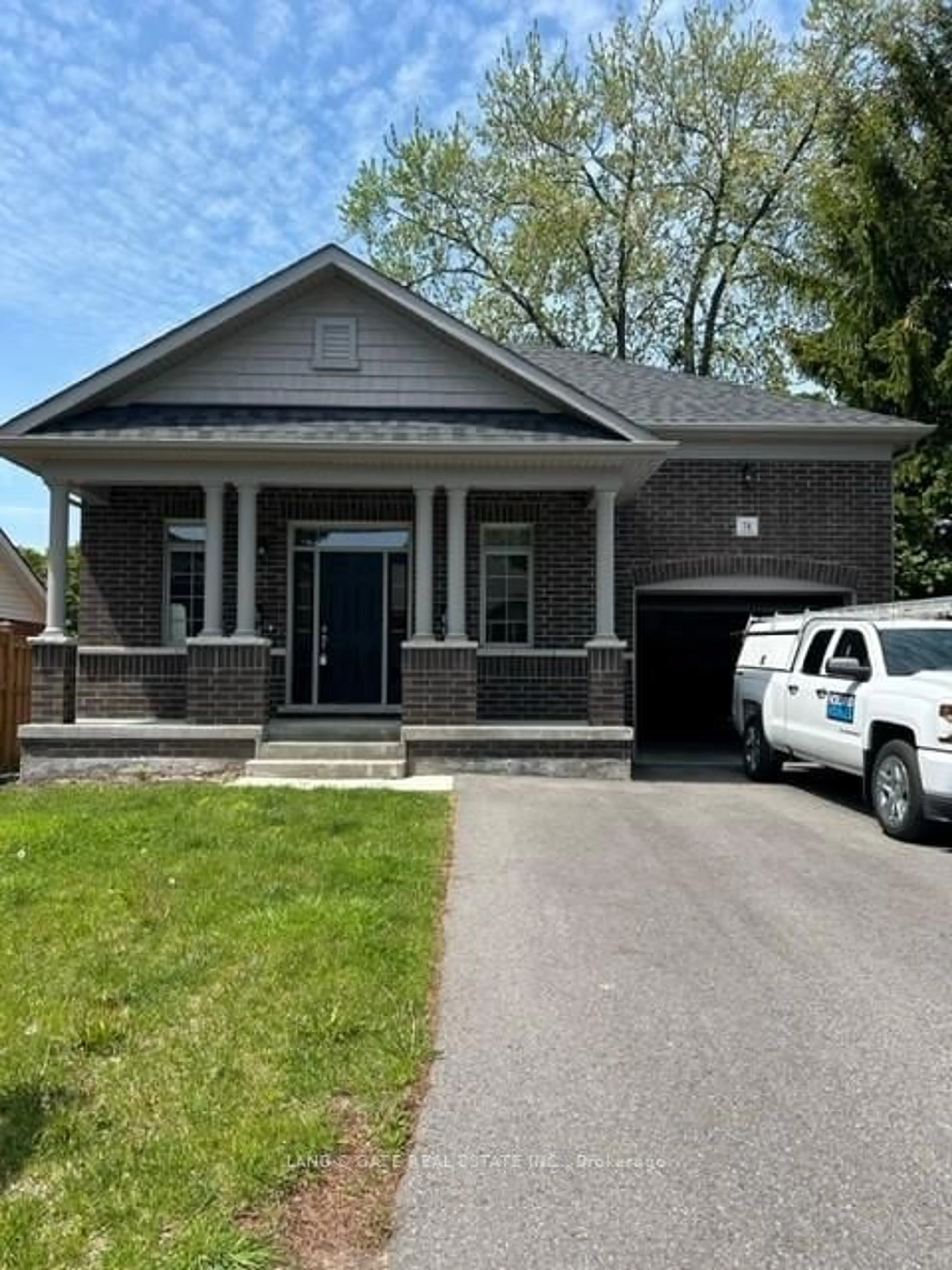 Home with brick exterior material, street for 74 Lambs Lane, Clarington Ontario L1C 3G5