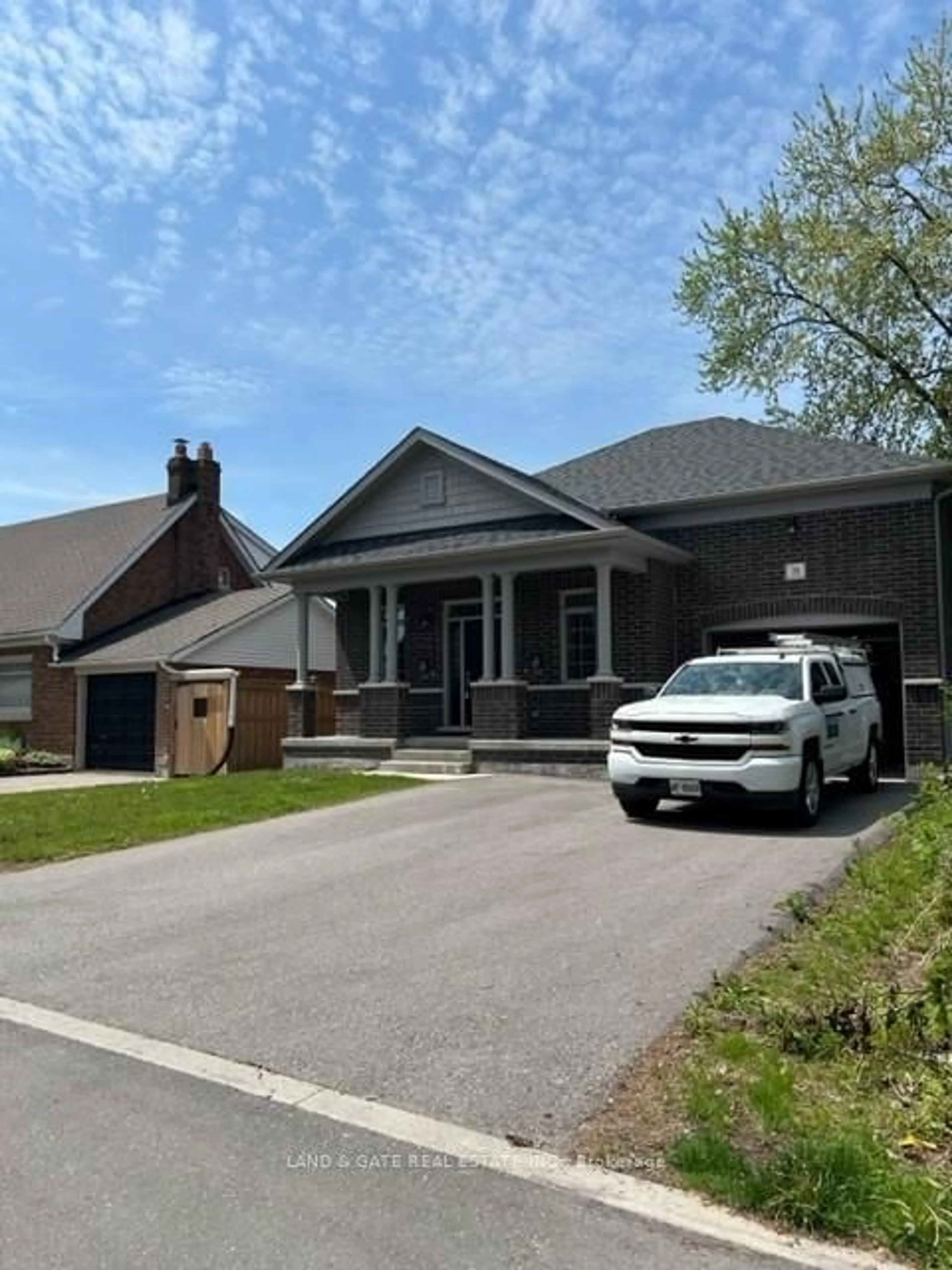 Home with brick exterior material, street for 74 Lambs Lane, Clarington Ontario L1C 3G5
