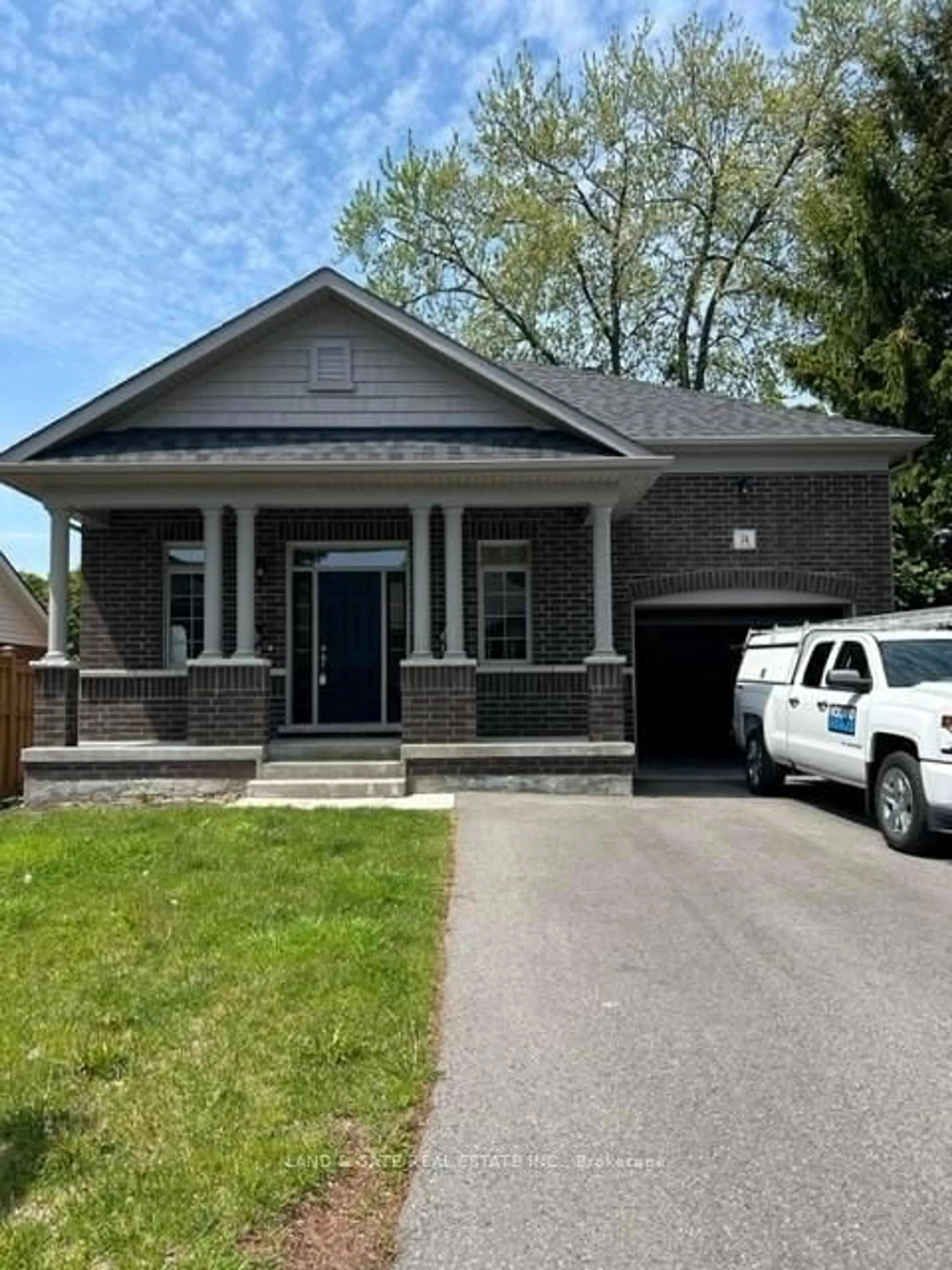 Home with brick exterior material, street for 74 Lambs Lane, Clarington Ontario L1C 3G5