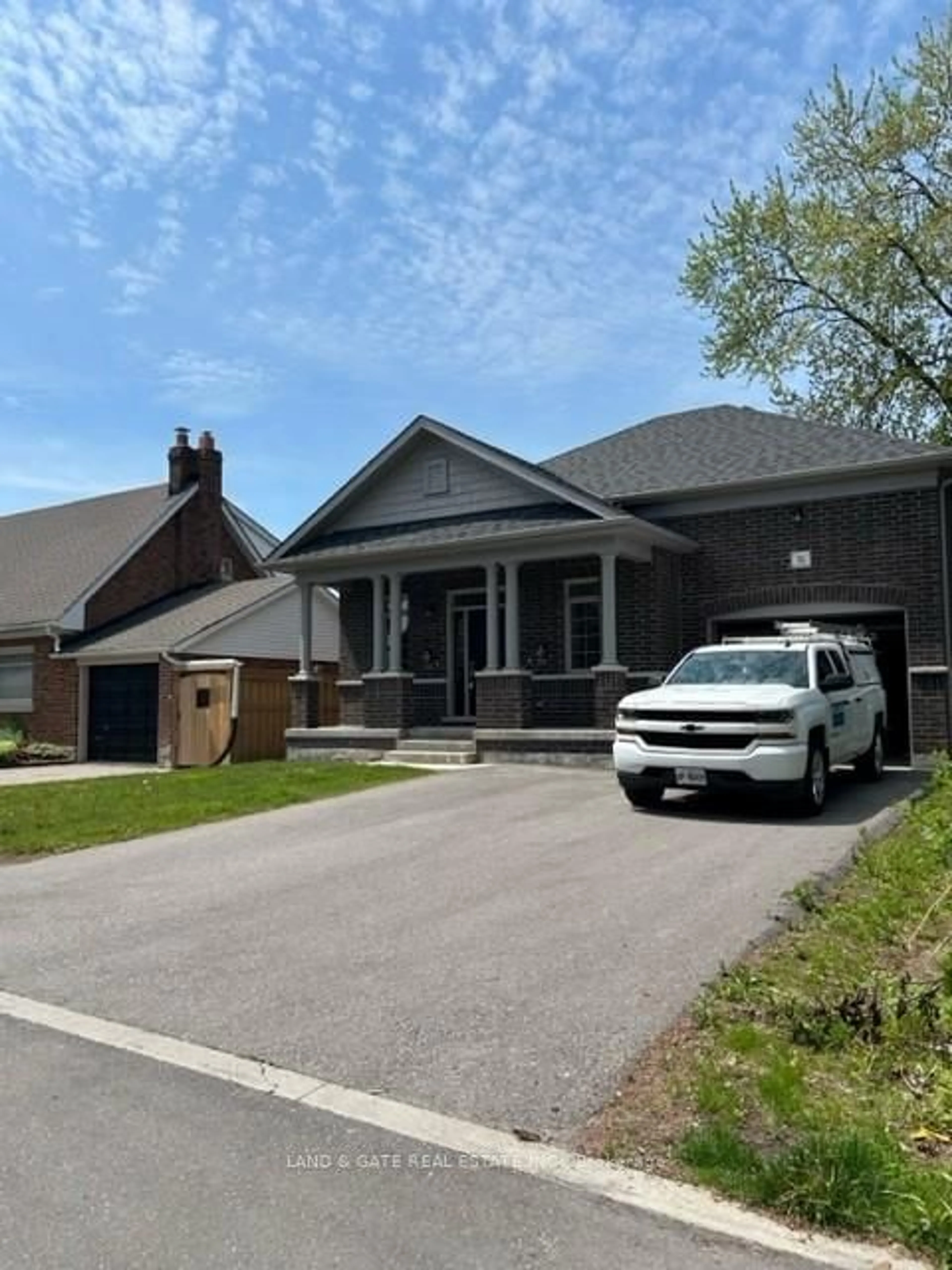 Home with brick exterior material, street for 74 Lambs Lane, Clarington Ontario L1C 3G5