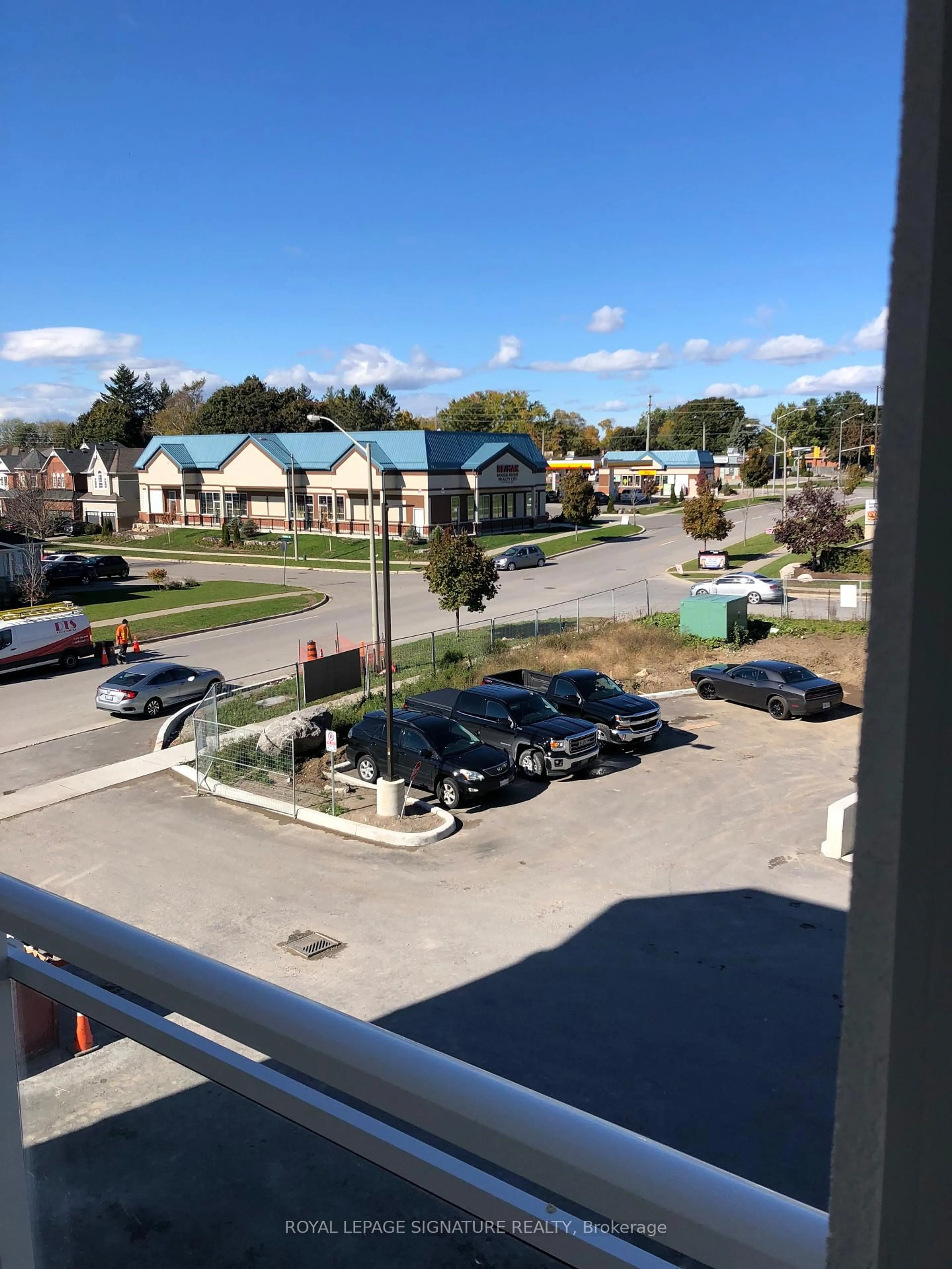 A pic from outside/outdoor area/front of a property/back of a property/a pic from drone, city buildings view from balcony for 21 Brookhouse Dr #321, Clarington Ontario L1B 0V4