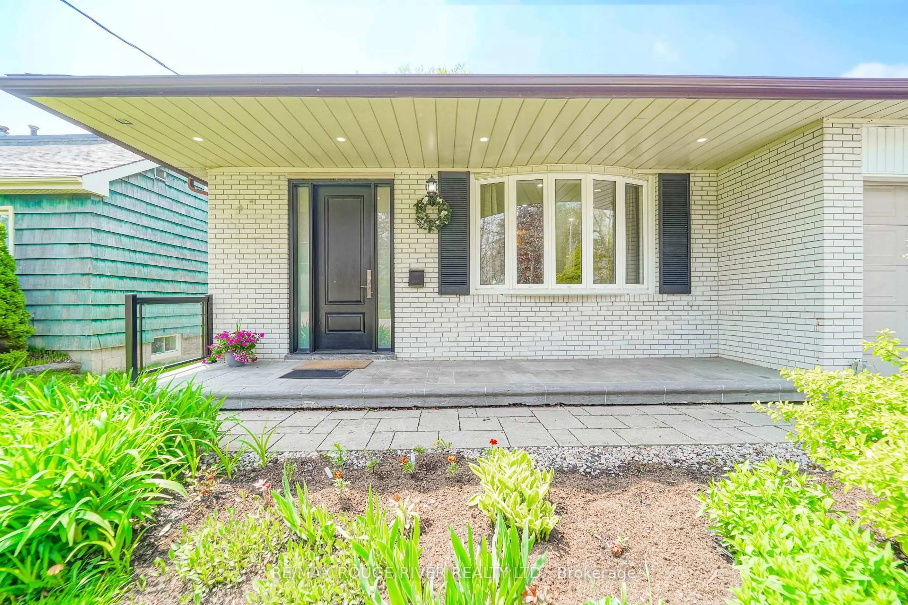 Home with brick exterior material, street for 204 Rouge Hills Dr, Toronto Ontario M1C 2Z1