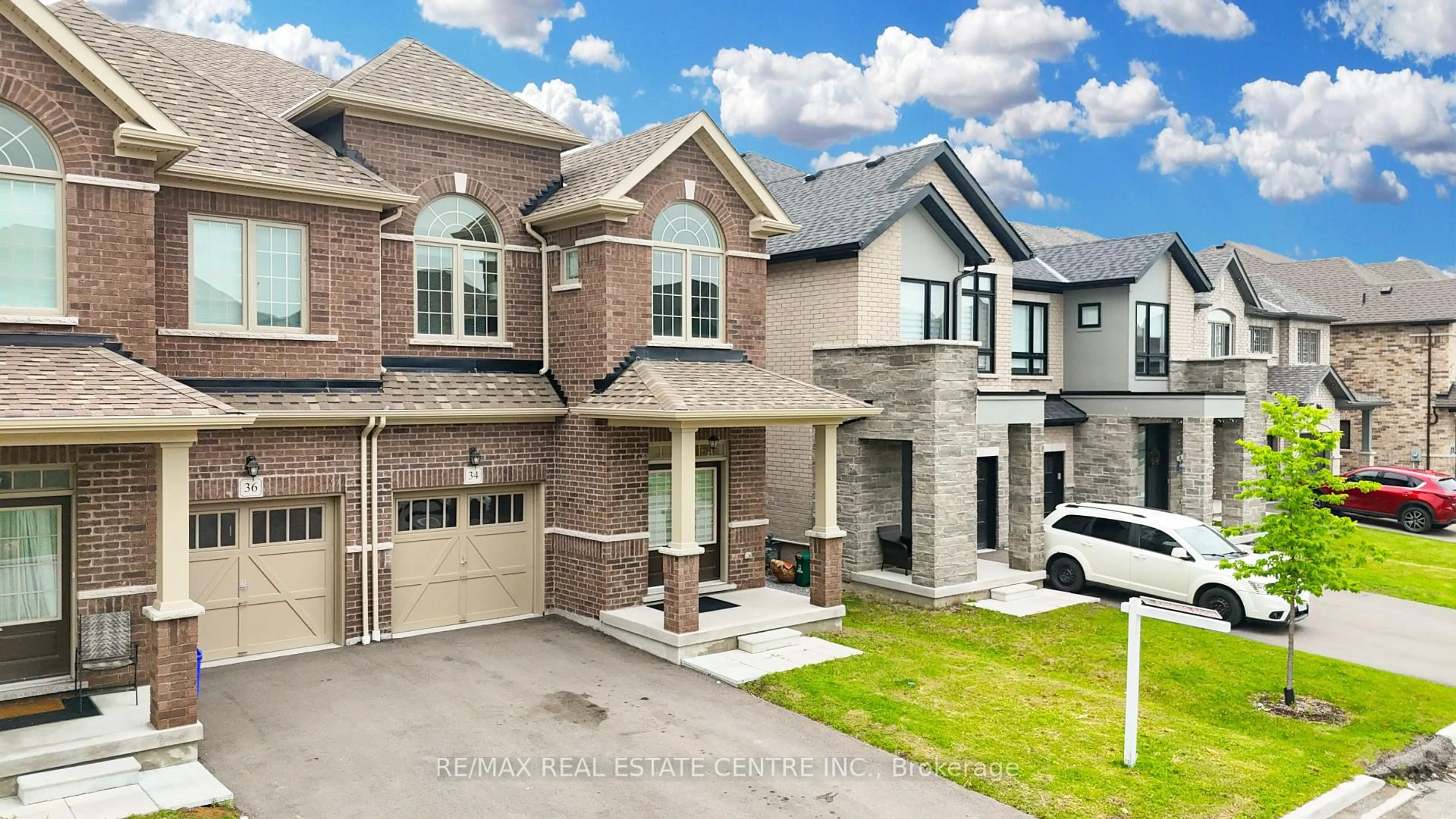 Home with brick exterior material, street for 34 Peter Hogg Crt, Ajax Ontario L1P 0N2
