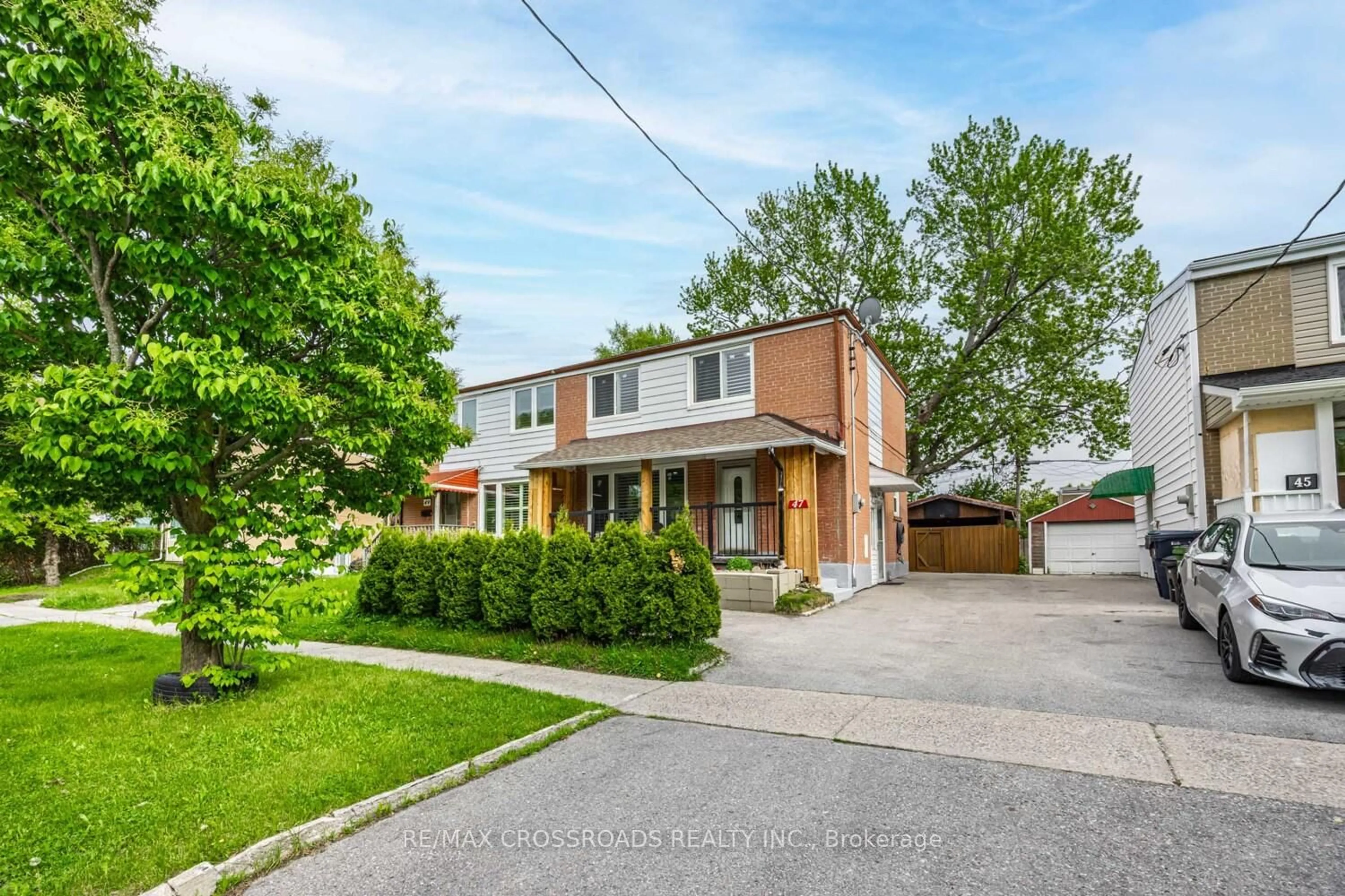 Home with brick exterior material, street for 47 Bonniewood Rd, Toronto Ontario M1K 2L9