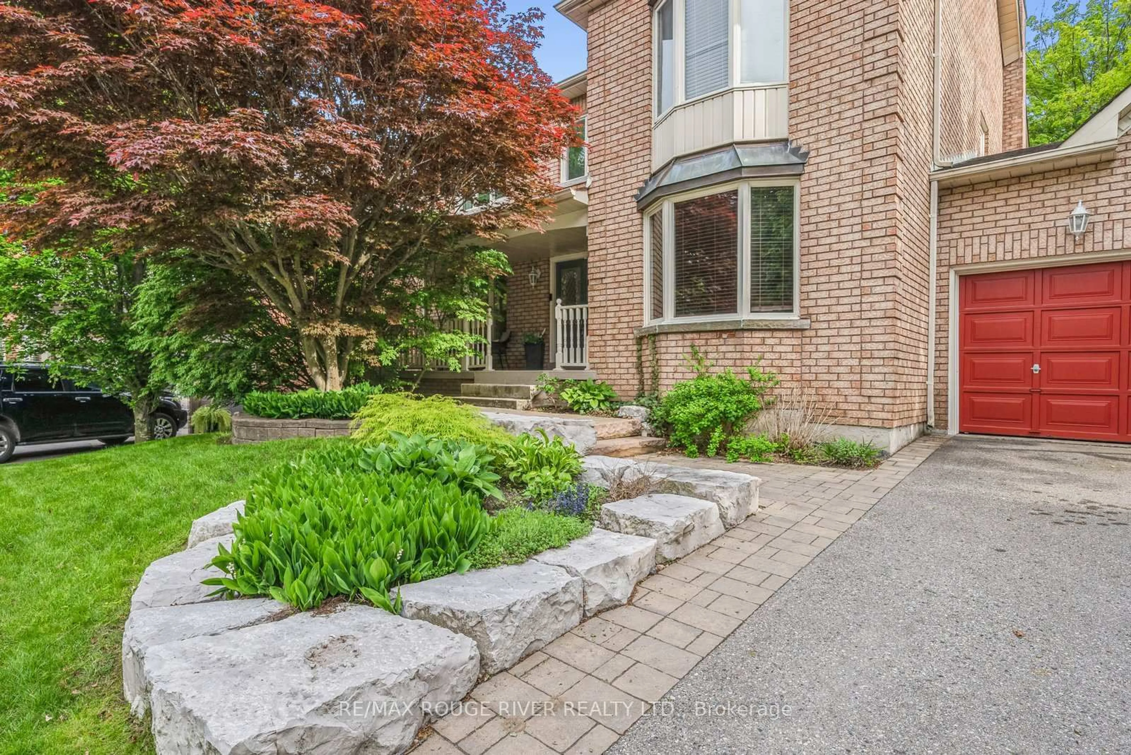 Home with brick exterior material, street for 921 Duncannon Dr, Pickering Ontario L1X 2M4