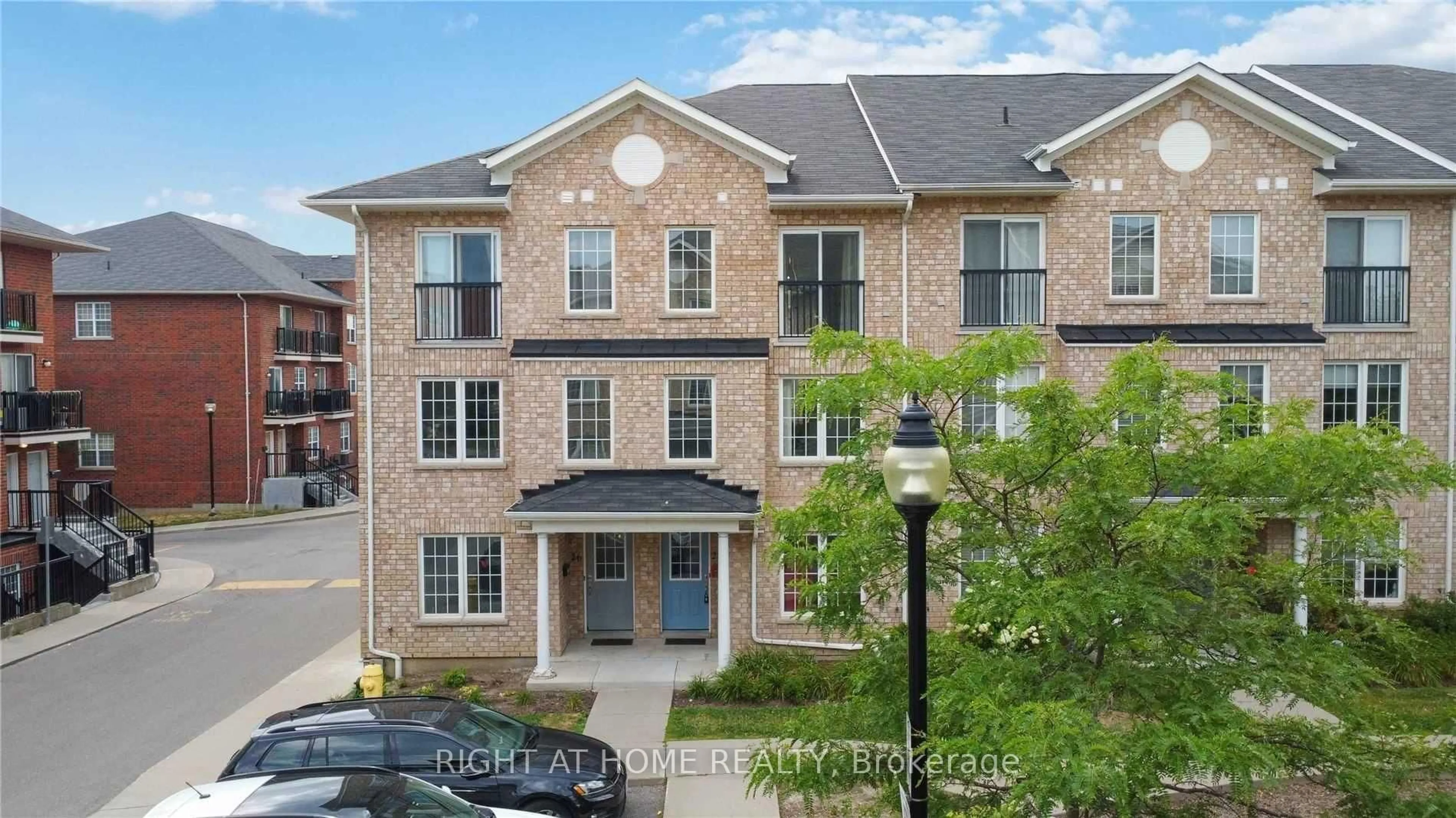 A pic from outside/outdoor area/front of a property/back of a property/a pic from drone, street for 28 Strangford Lane, Toronto Ontario M1L 0E4