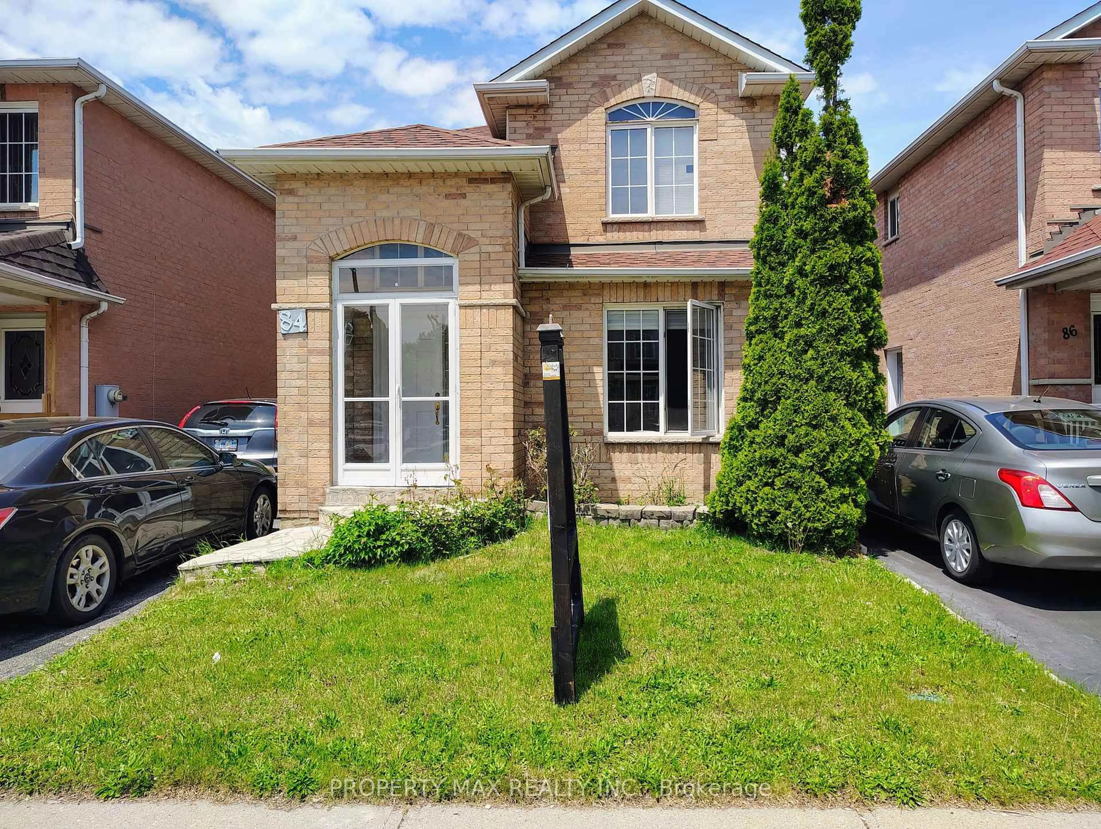 Home with brick exterior material, street for 84 Bridlegrove Dr, Toronto Ontario M1W 3W9