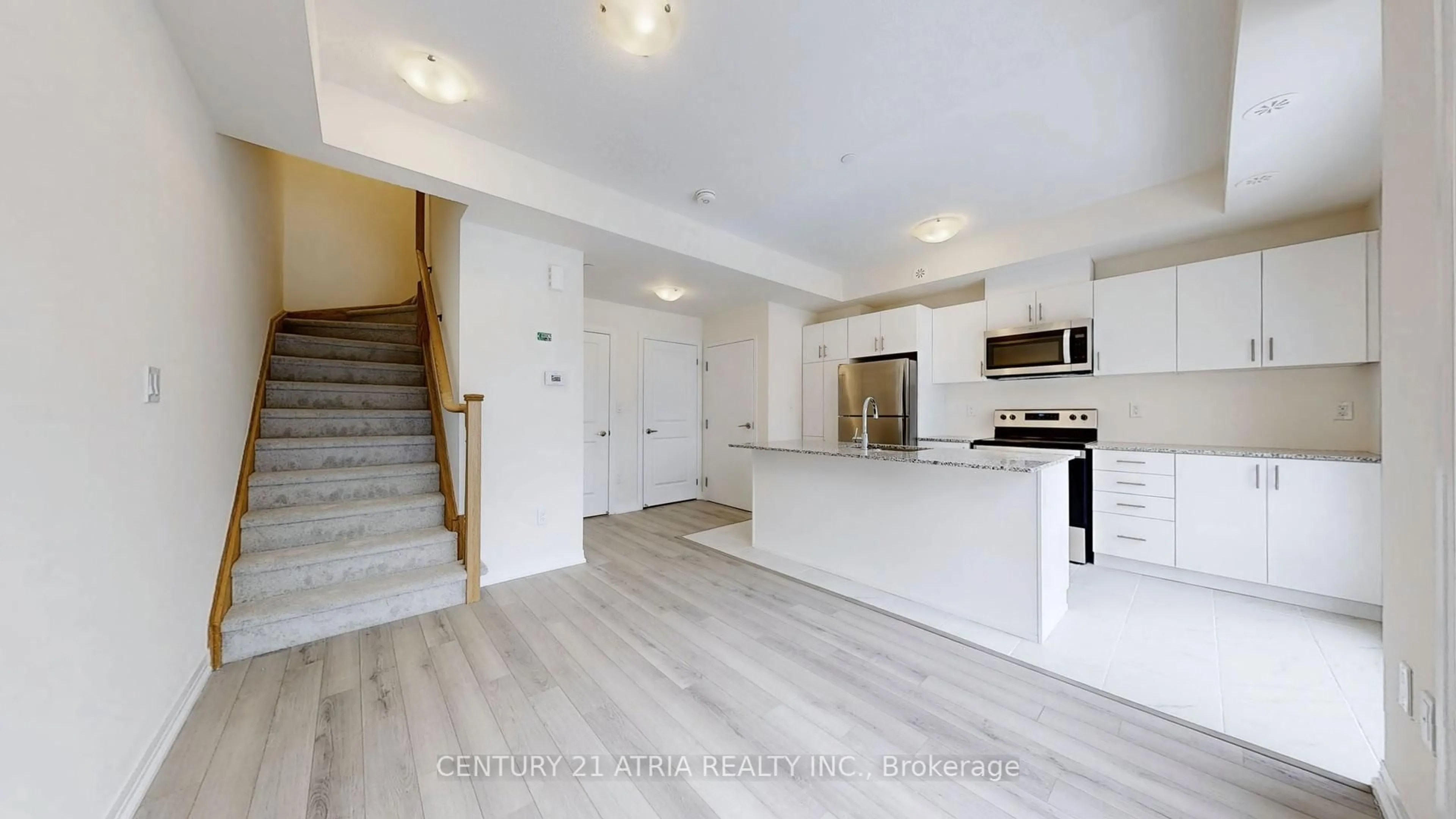 Open concept kitchen, unknown for 165 Tapscott Rd #32, Toronto Ontario M1B 0E8