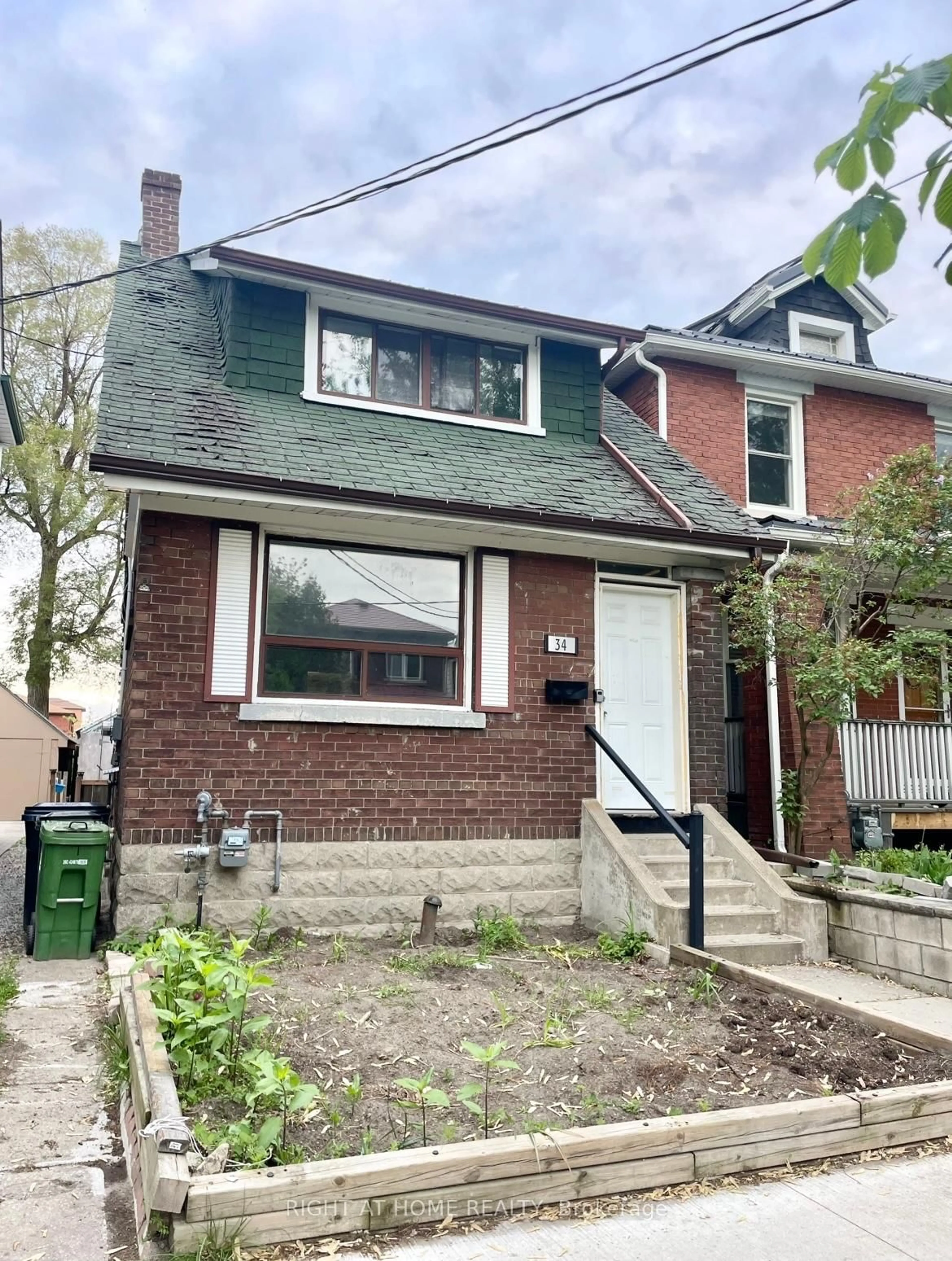 Home with brick exterior material, street for 34 Woodington Ave, Toronto Ontario M4C 3J3