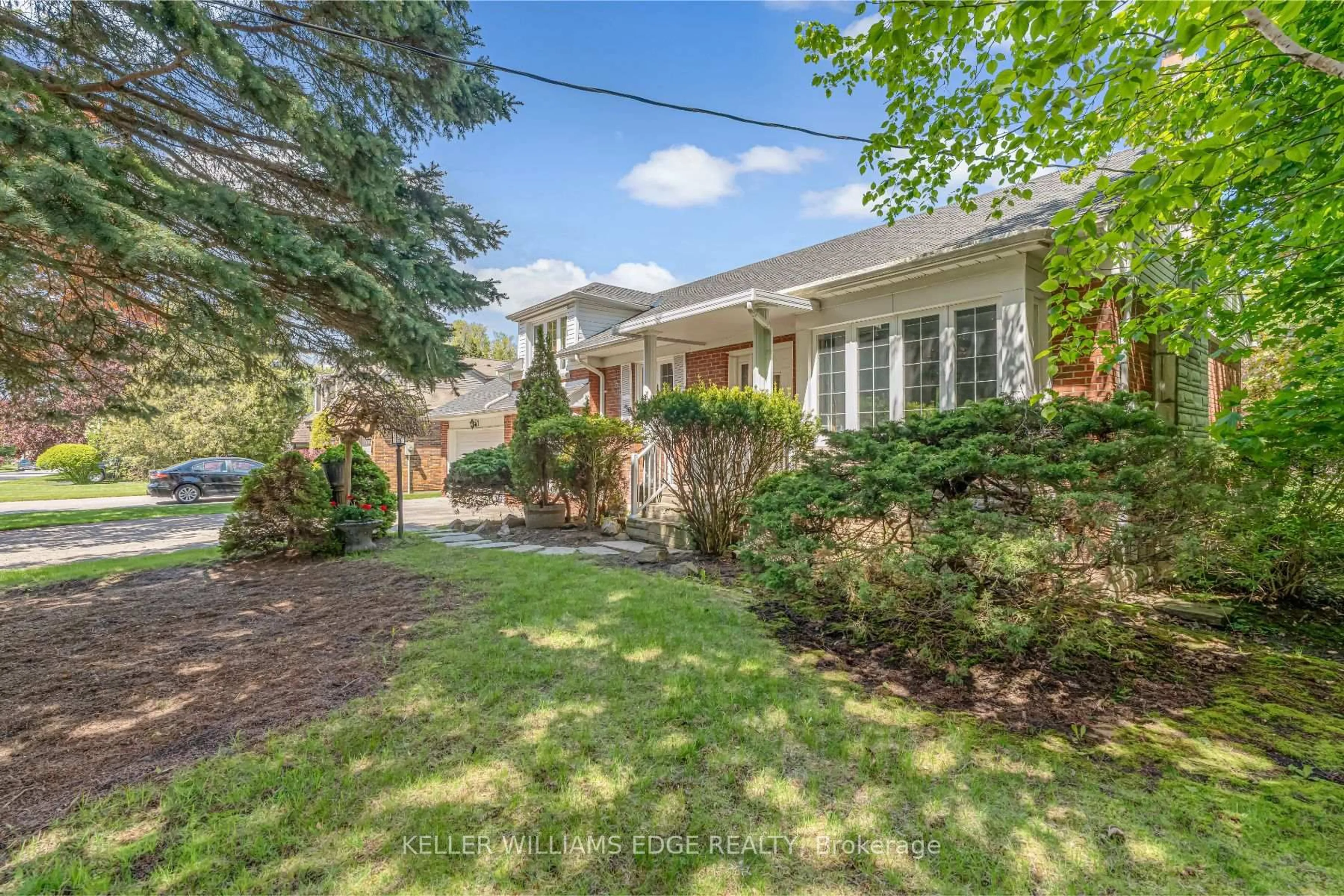 Home with brick exterior material, street for 41 McNab Blvd, Toronto Ontario M1M 2W6