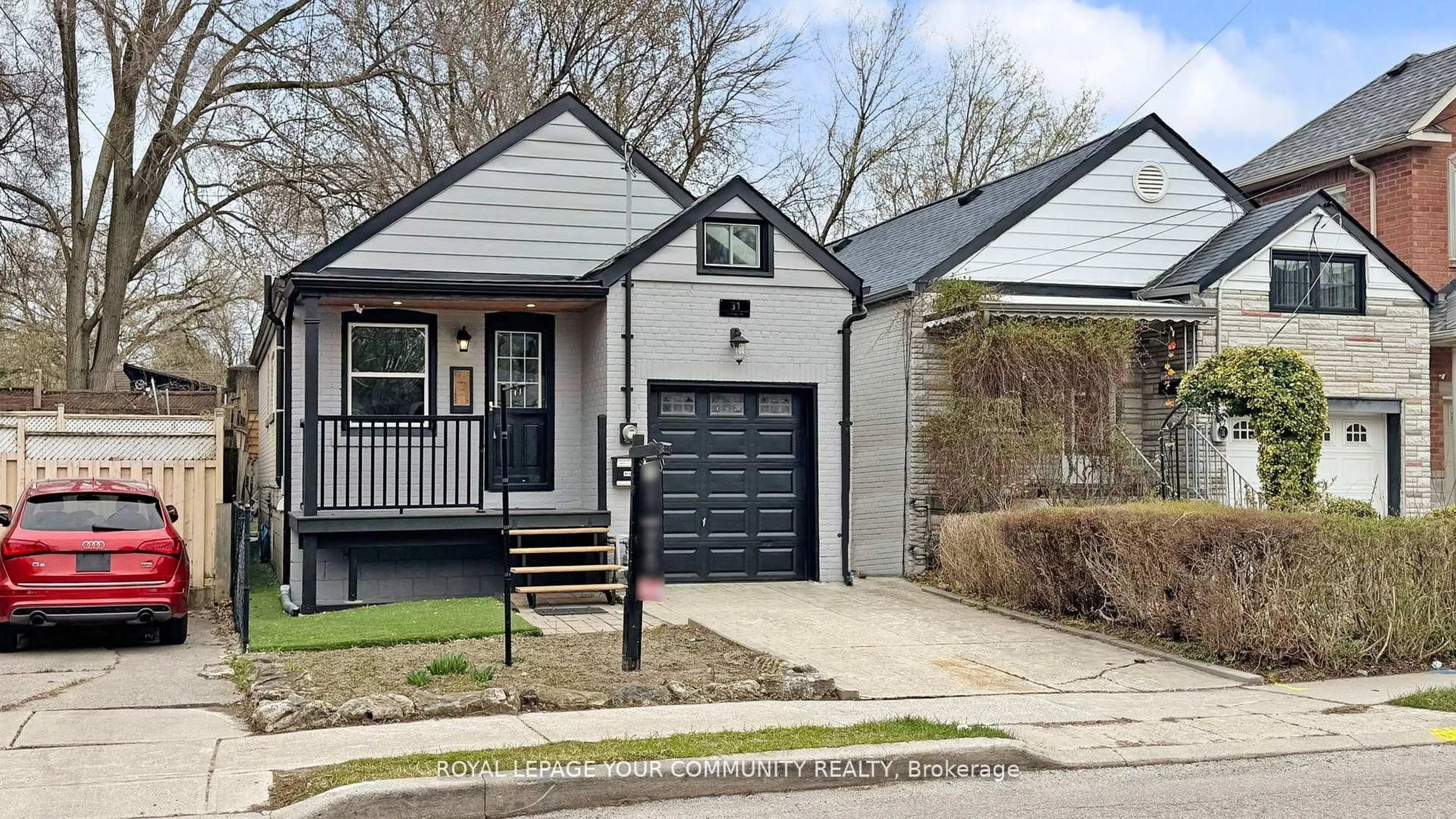 Home with vinyl exterior material, street for 31 Hamstead Ave, Toronto Ontario M4C 2S3