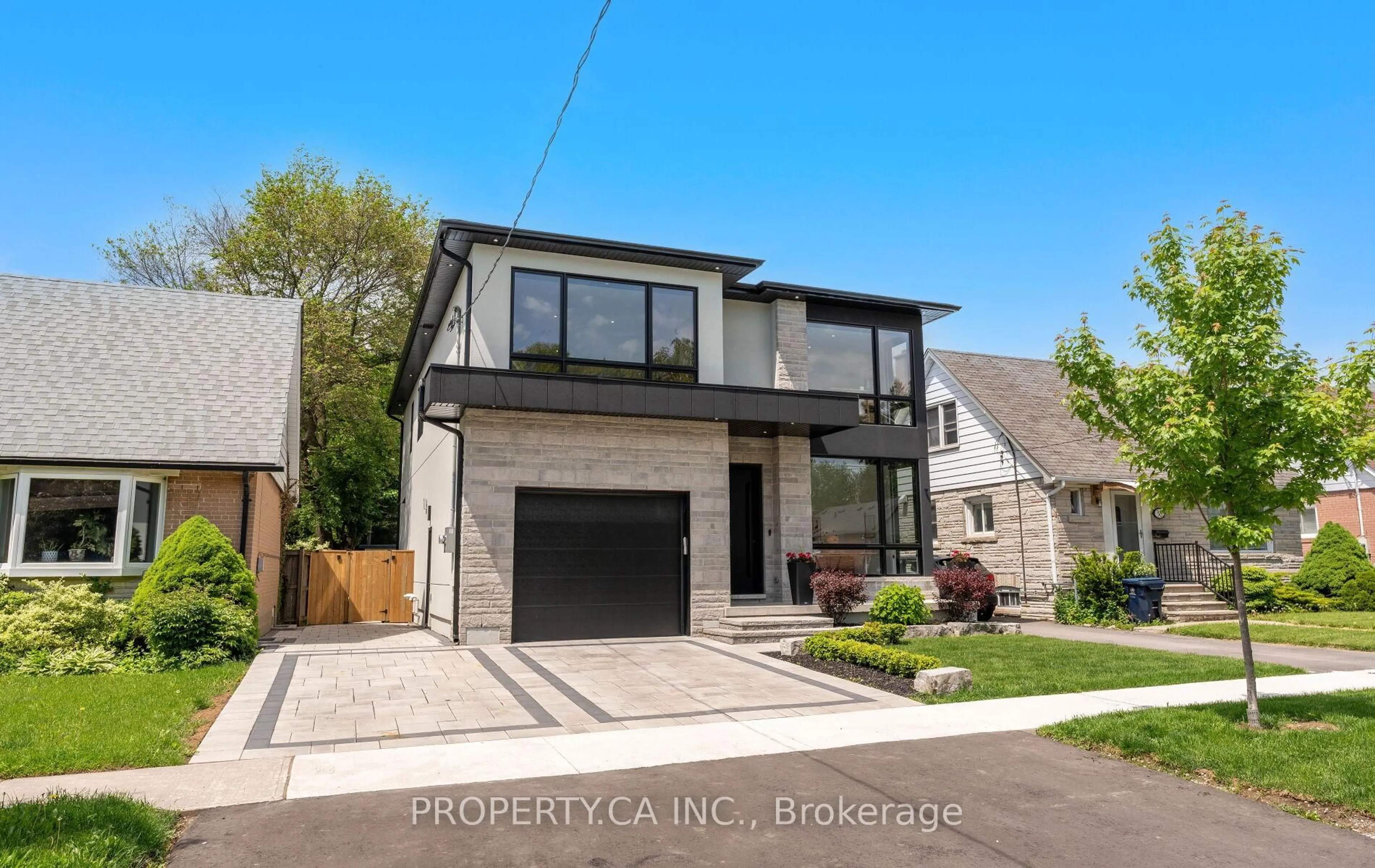 Home with brick exterior material, street for 36 Karnwood Dr, Toronto Ontario M1L 2Z5