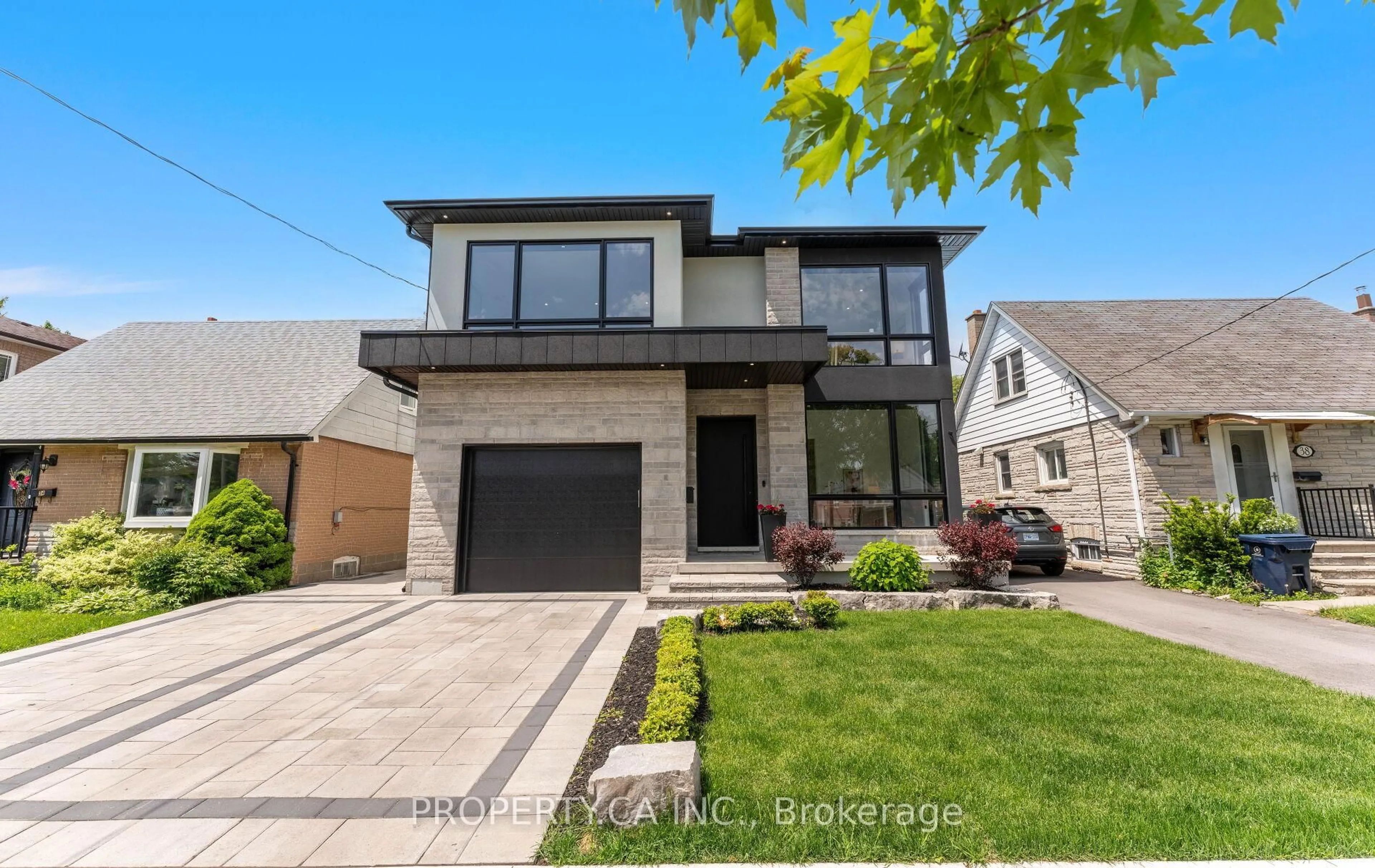 Home with brick exterior material, street for 36 Karnwood Dr, Toronto Ontario M1L 2Z5
