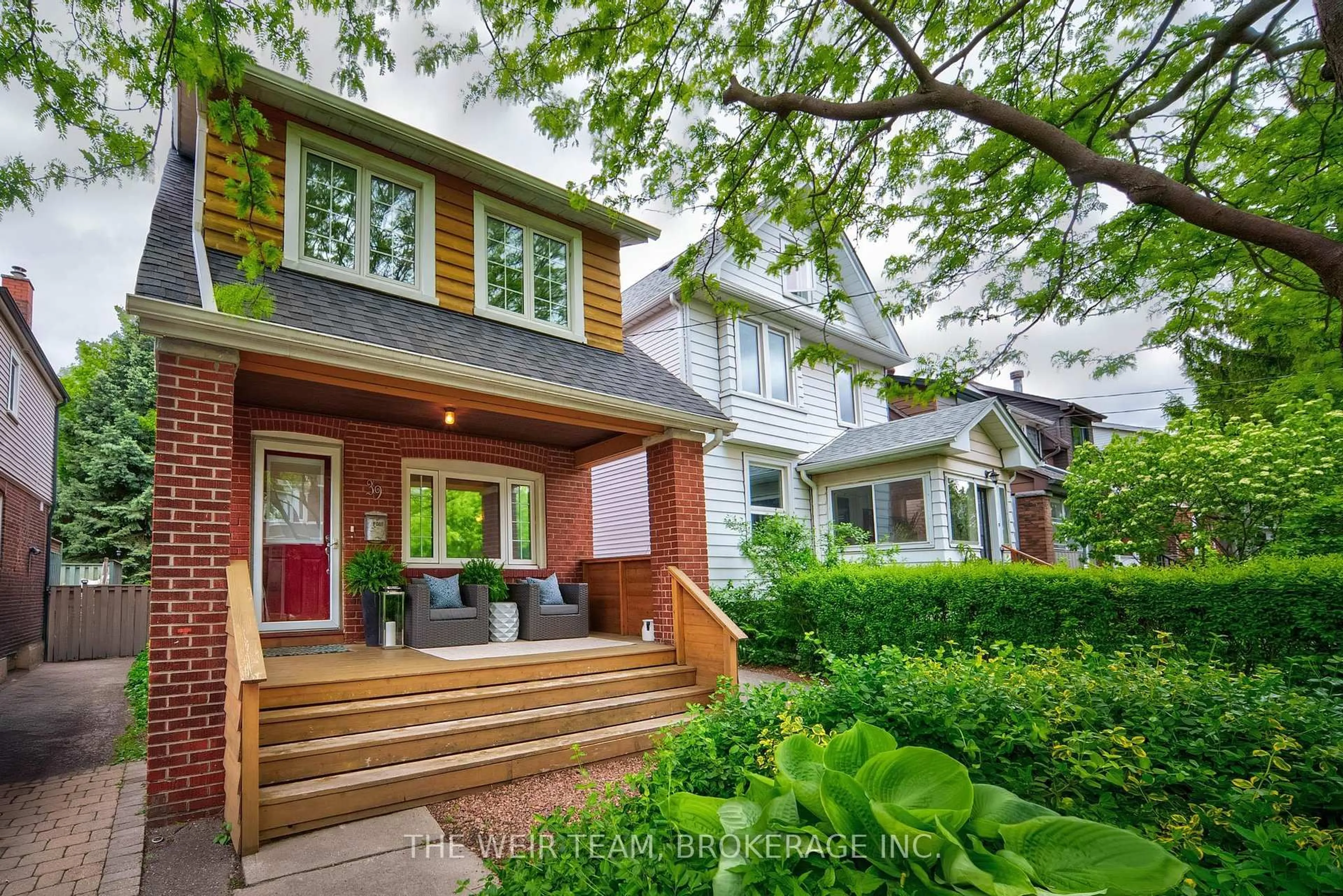 Home with brick exterior material, street for 39 Ashland Ave, Toronto Ontario M4L 1J9