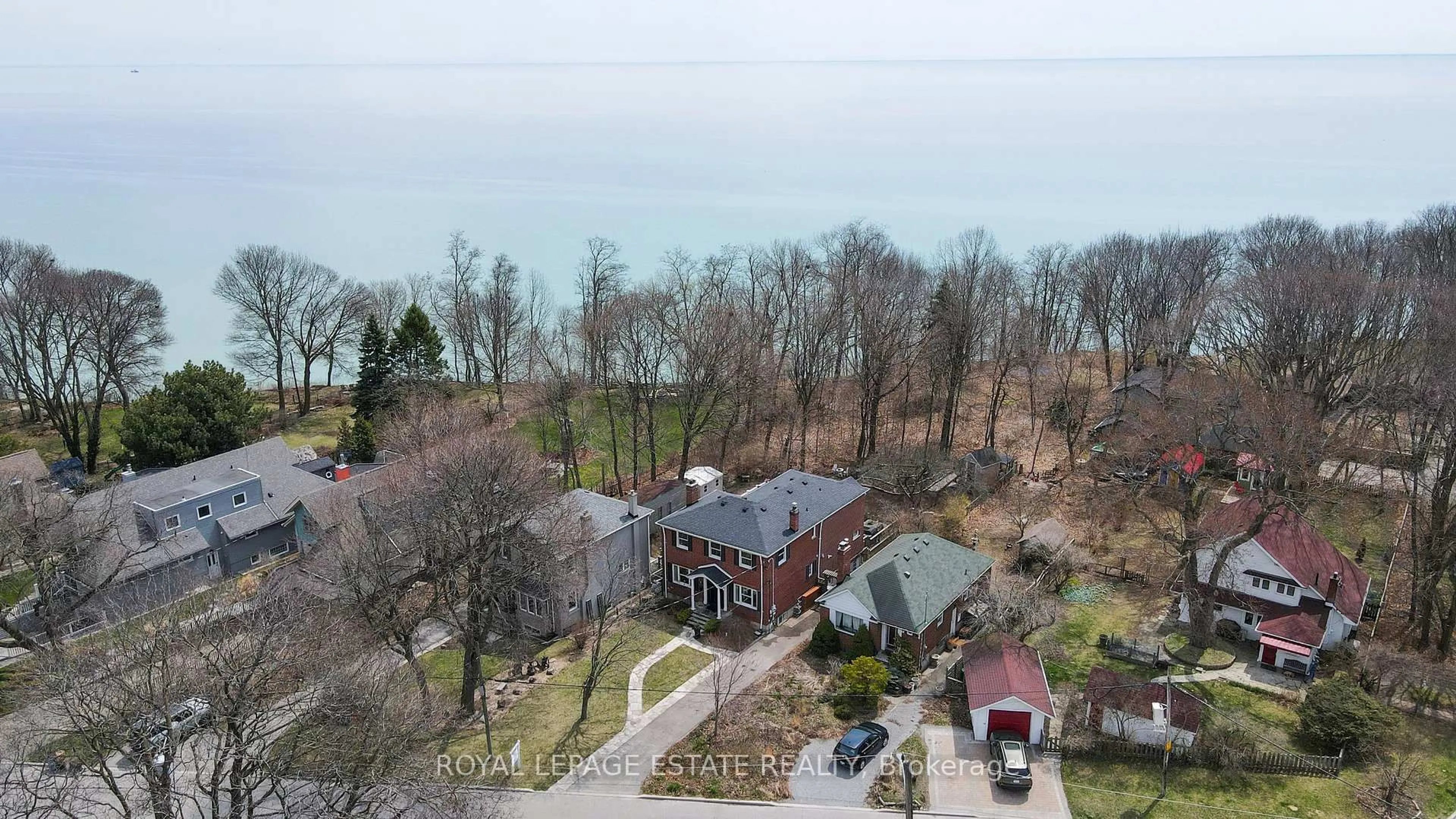 A pic from outside/outdoor area/front of a property/back of a property/a pic from drone, water/lake/river/ocean view for 3 Springbank Ave, Toronto Ontario M1N 1G2