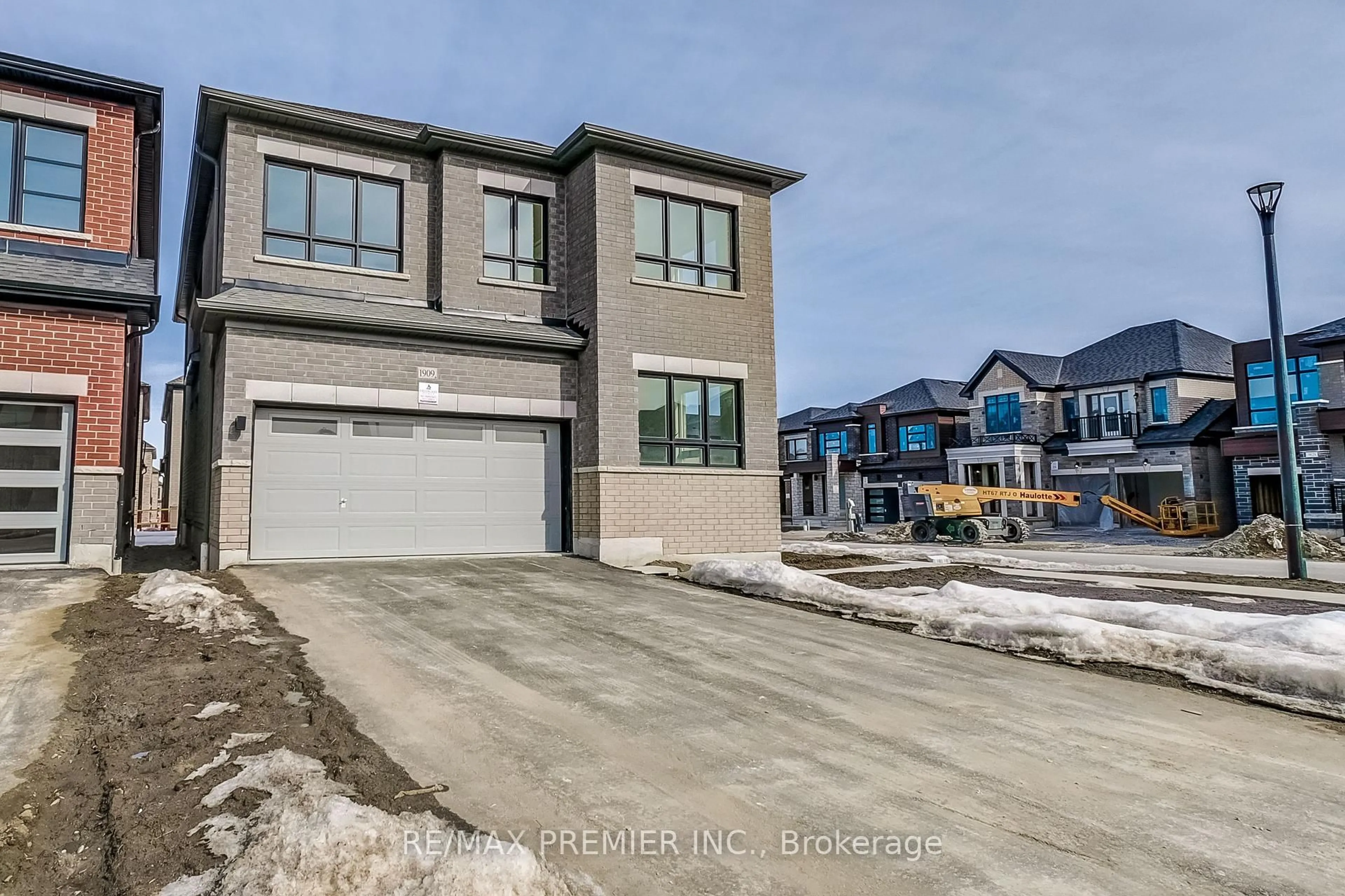 Home with brick exterior material, street for 1909 Passionfruit Grve, Pickering Ontario L1Y 0B4