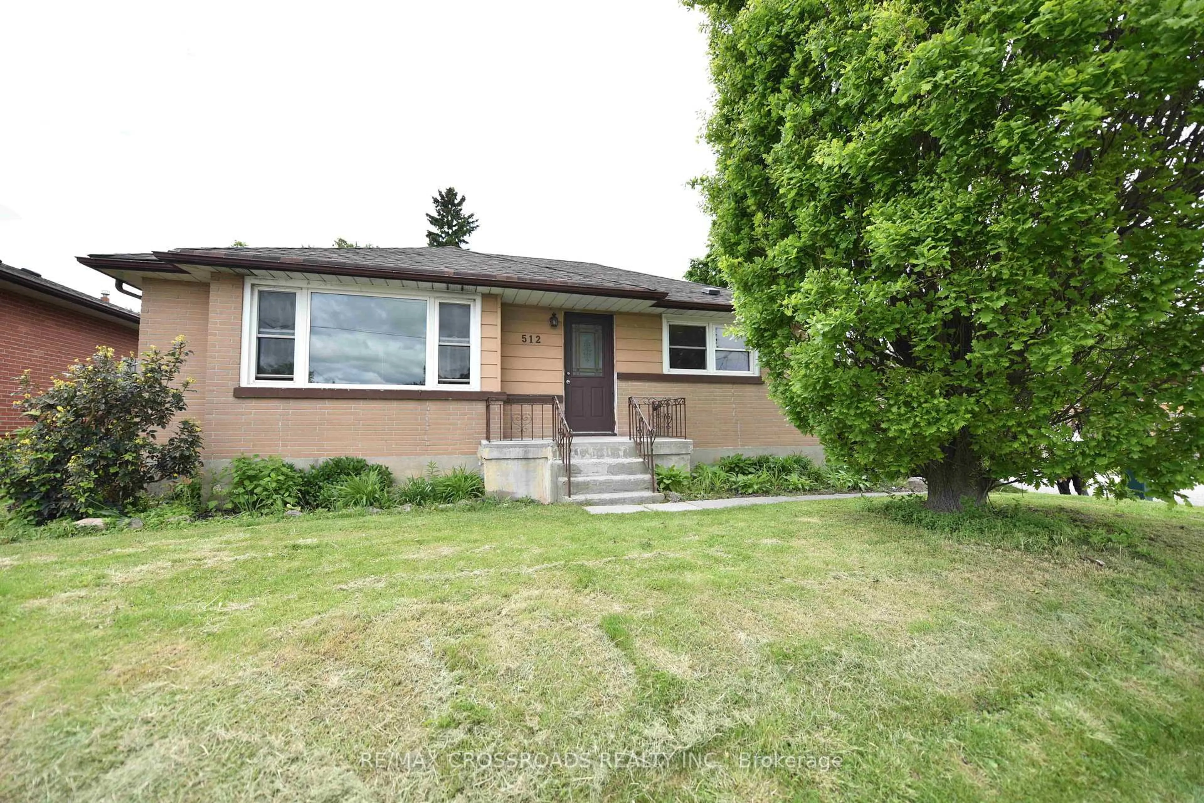 Home with brick exterior material, street for 512 Wilson Rd, Oshawa Ontario L1H 6E2