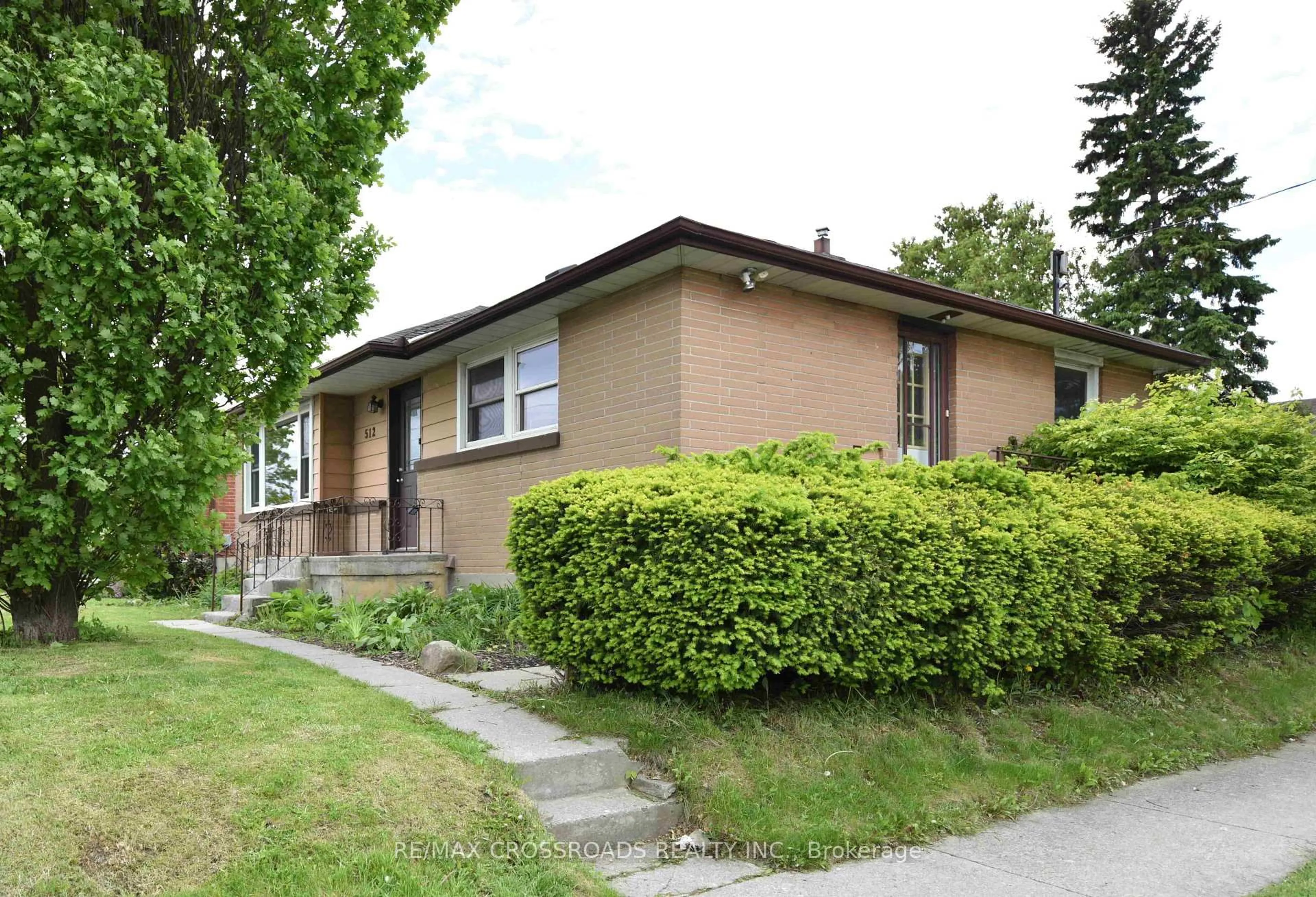 Home with brick exterior material, street for 512 Wilson Rd, Oshawa Ontario L1H 6E2