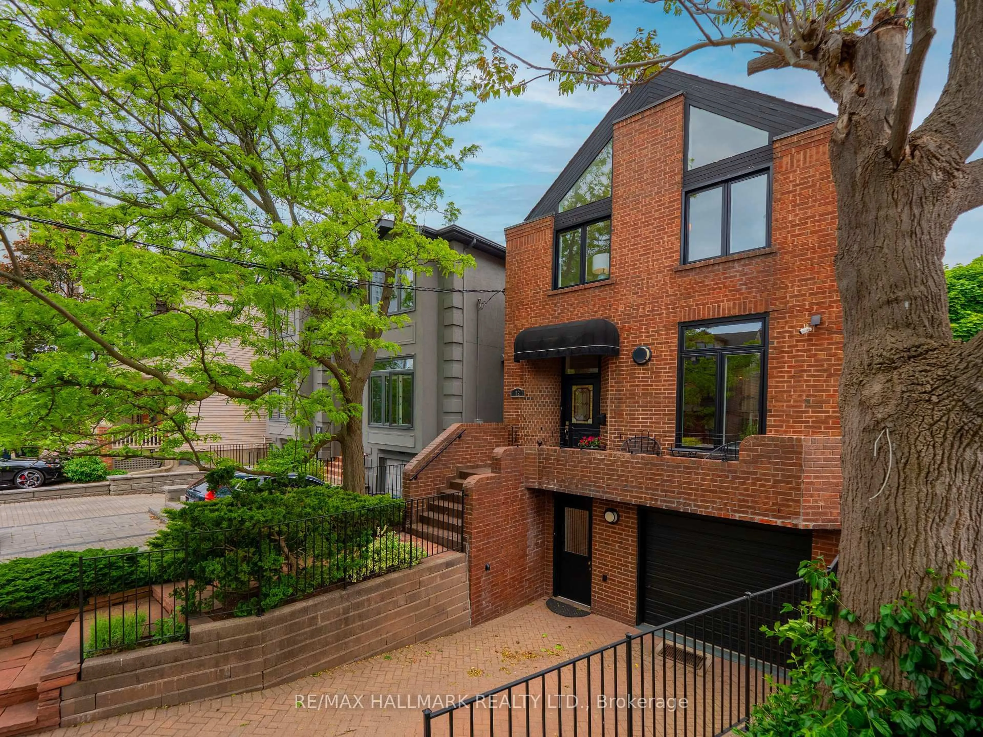 Home with brick exterior material, street for 12 Pretoria Ave, Toronto Ontario M4K 1T1