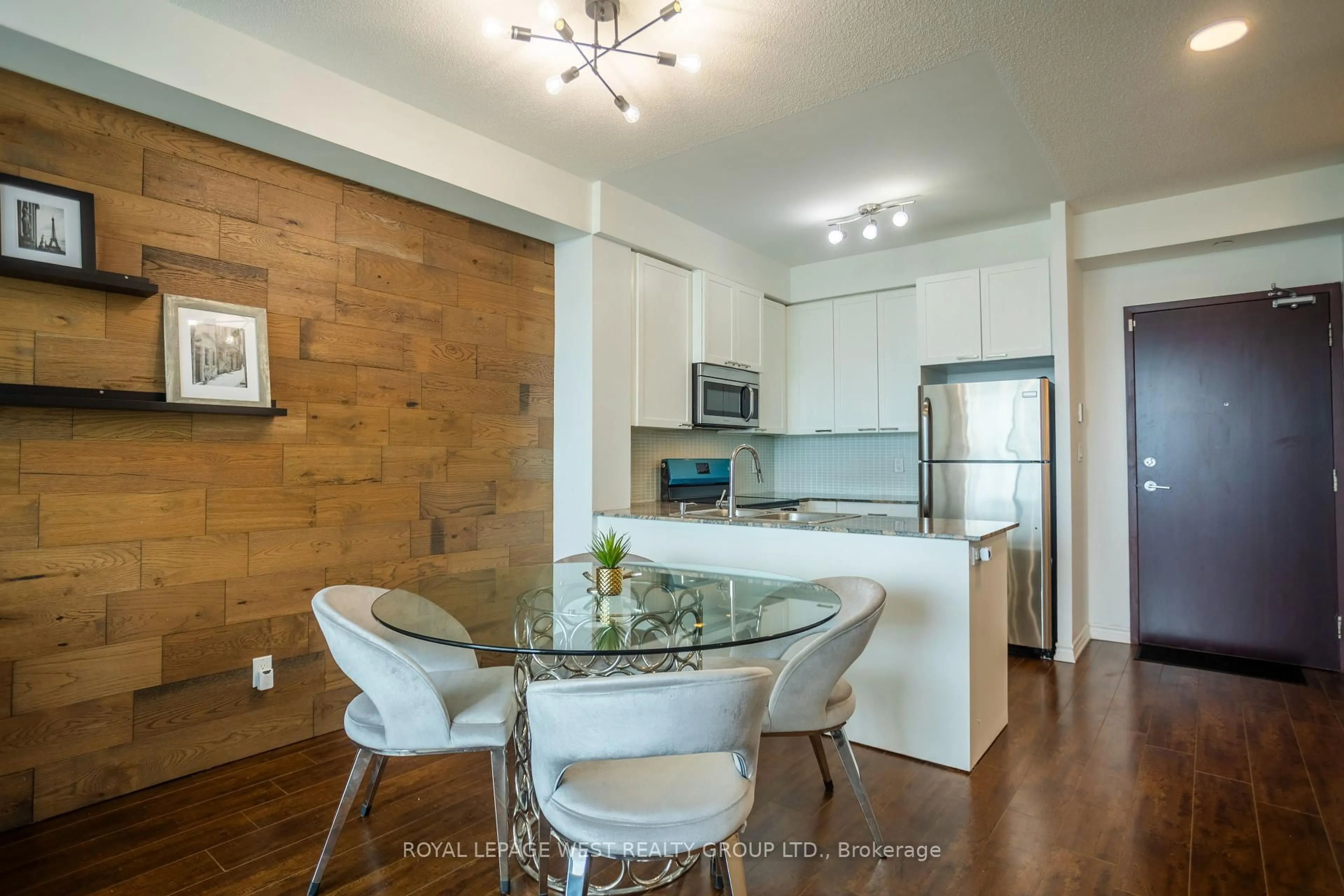 Open concept kitchen, wood/laminate floor for 1328 Birchmount Rd #2104, Toronto Ontario M1R 0B6