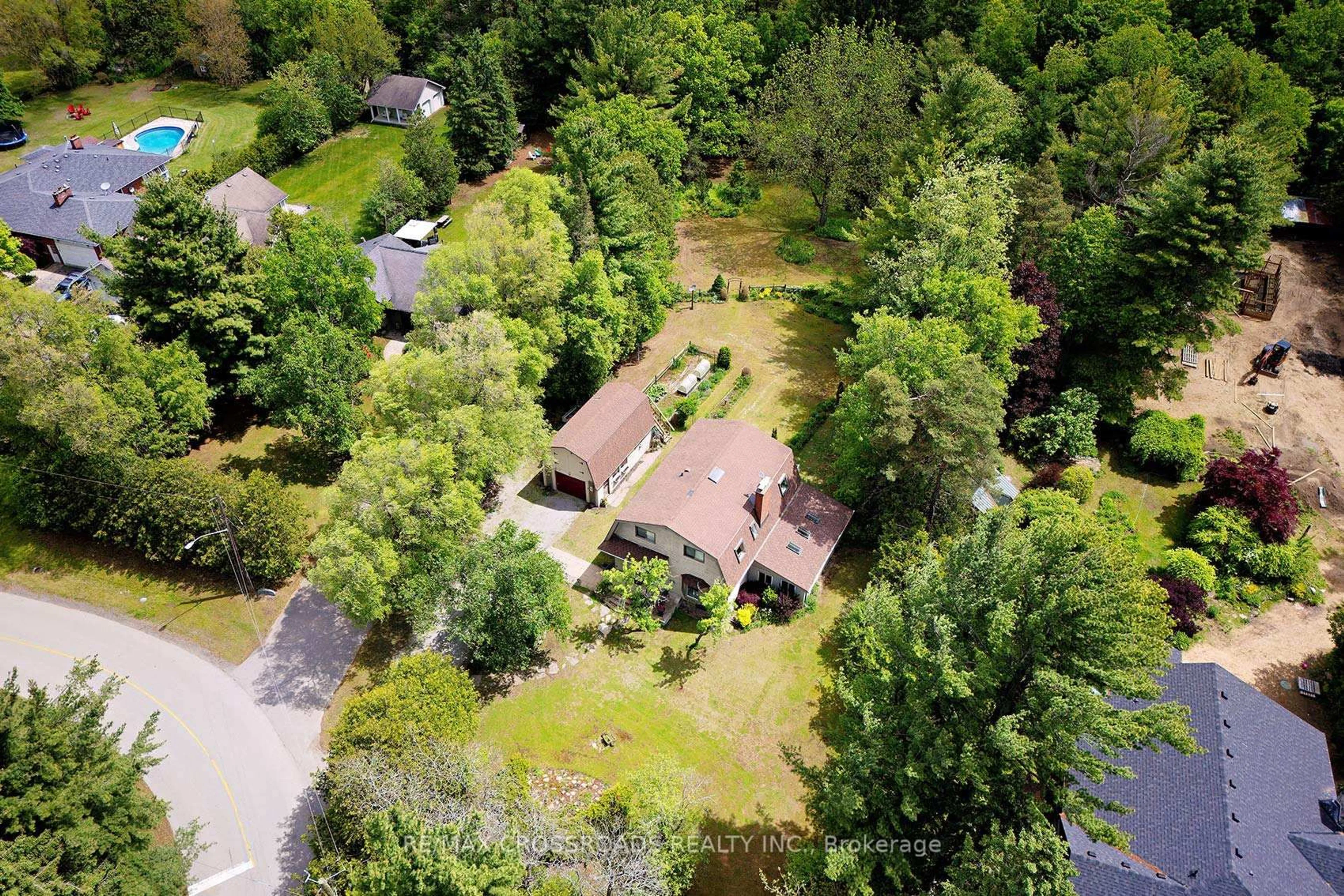 A pic from outside/outdoor area/front of a property/back of a property/a pic from drone, forest/trees view for 5 Shepherd Rd, Whitby Ontario L1M 1G8